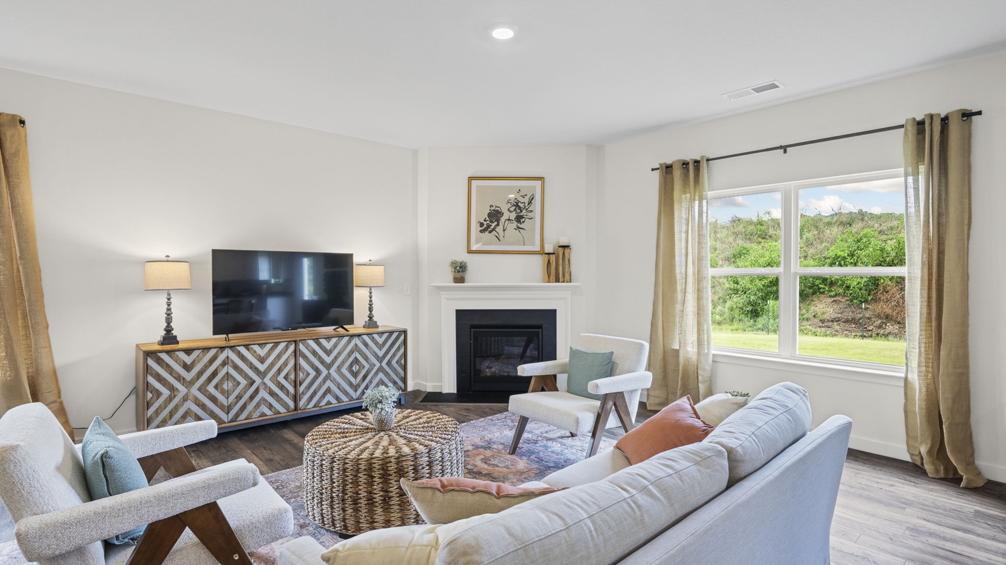 open concept living room with double window