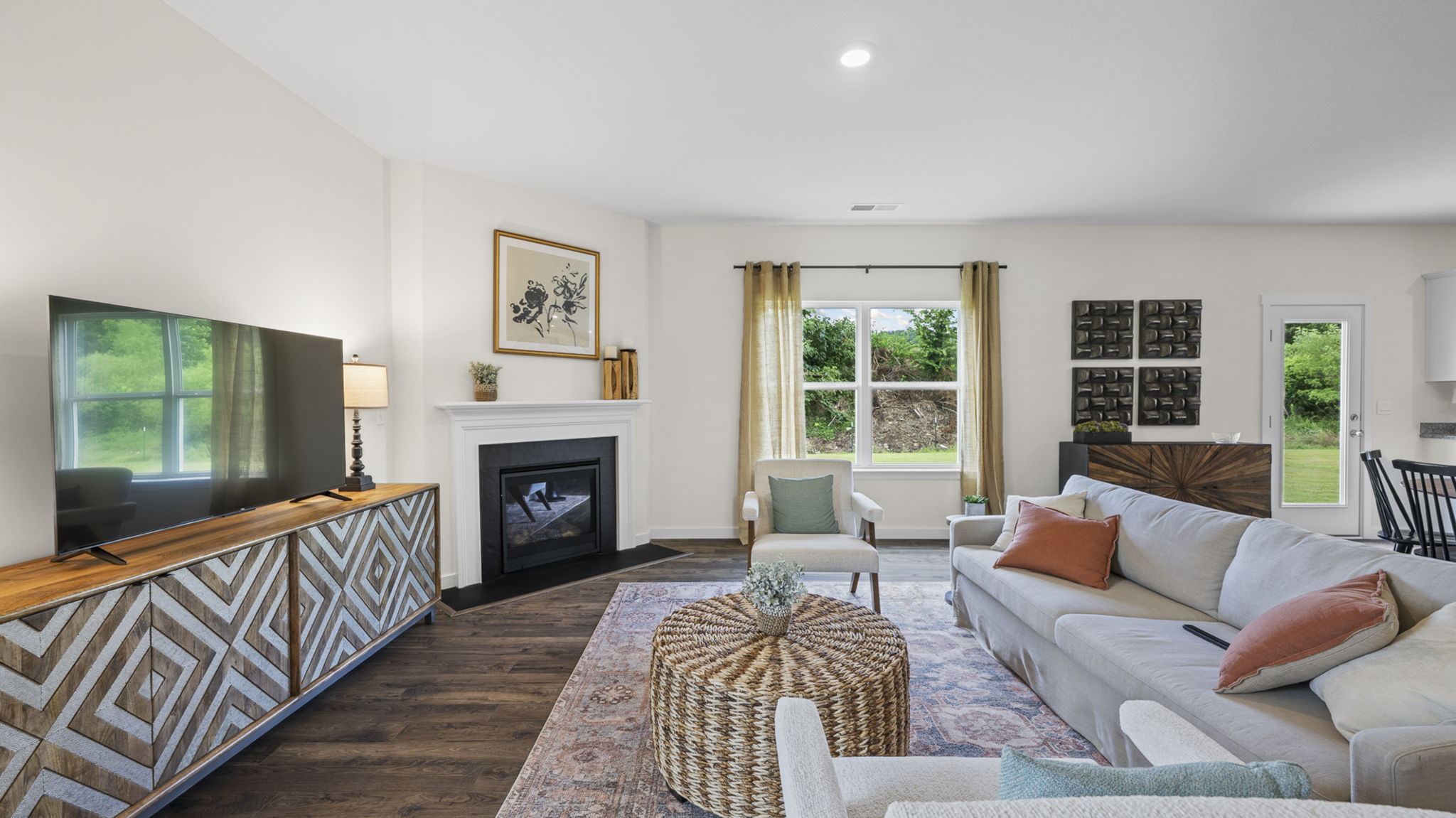 open concept living room with double window