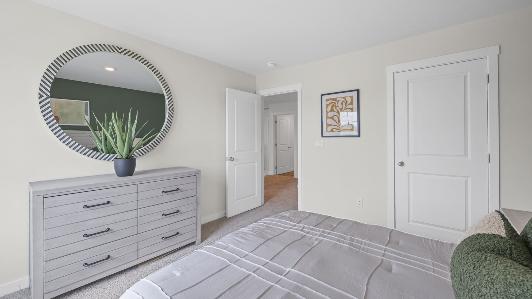bedroom with double window and walk-in closet