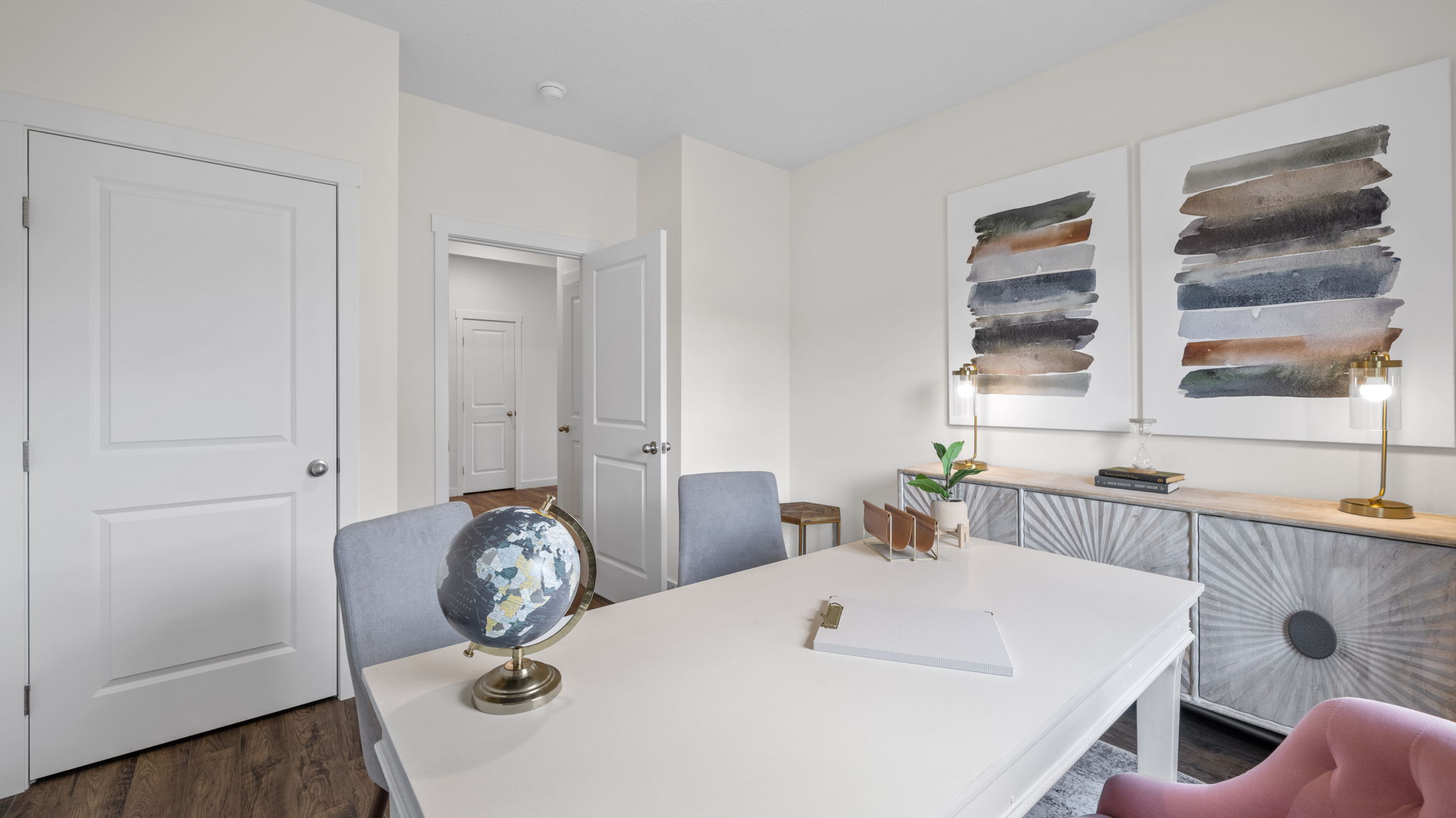 dining area with white table and chairs