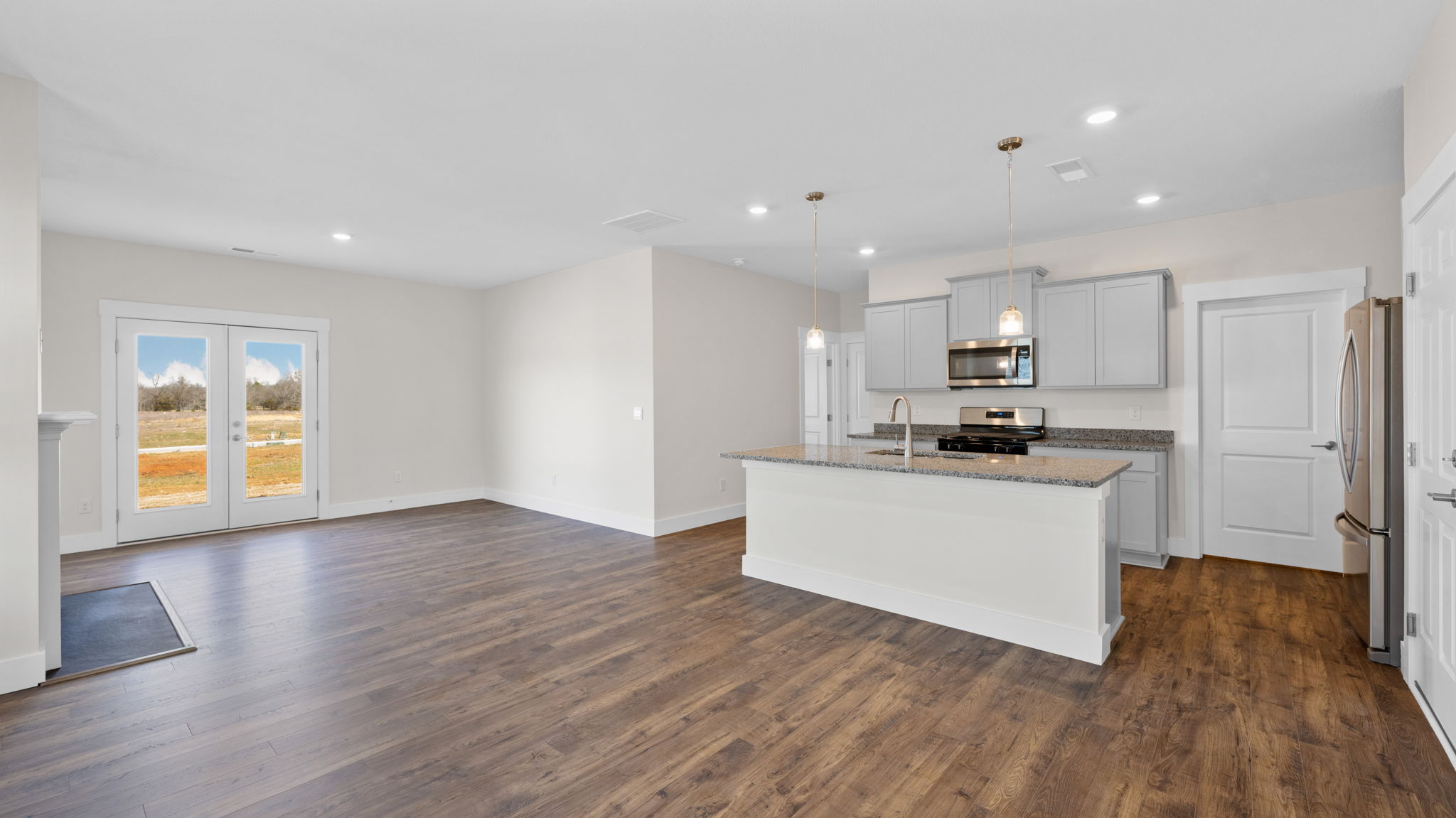The kitchen opens into the living area.
