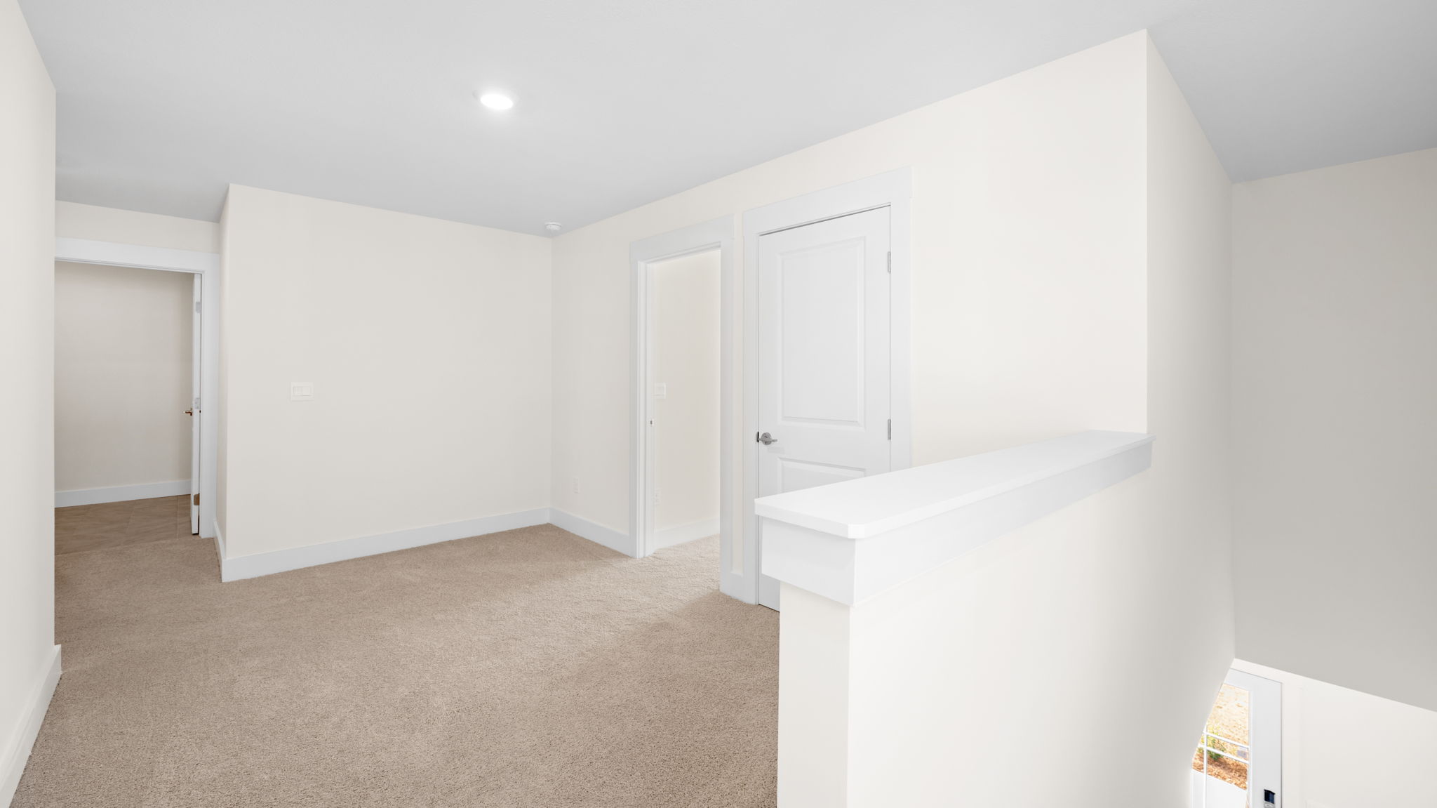 The second floor also features a convenient laundry room and a versatile loft space that can be used in many ways.