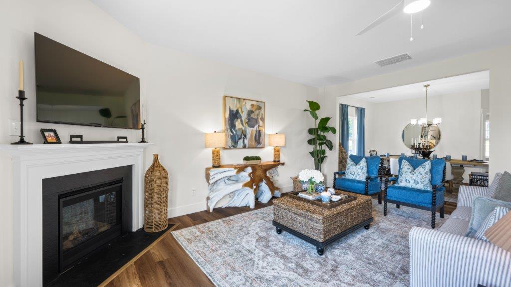 open concept living area with double window