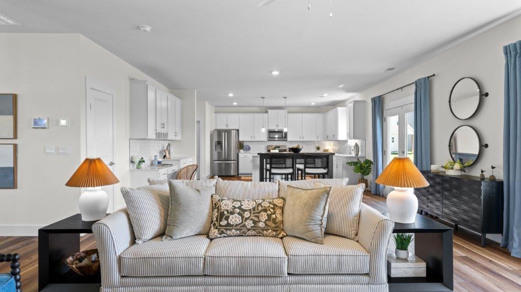 open concept living area with double window