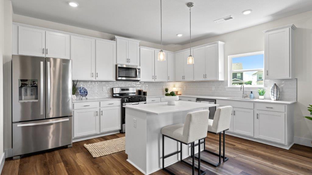 kitchen with large island and stainless steel appliances