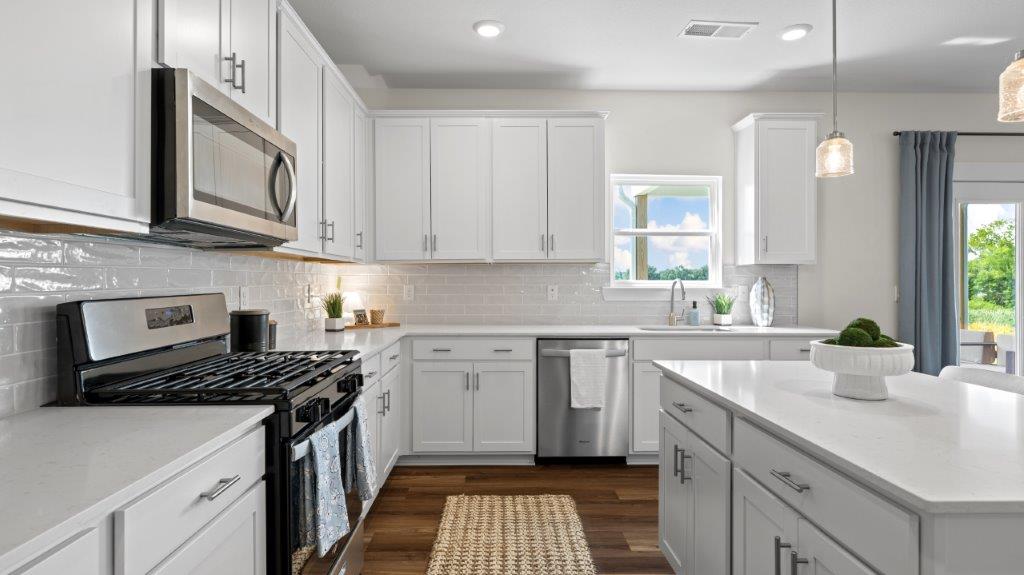 kitchen with large island and stainless steel appliances