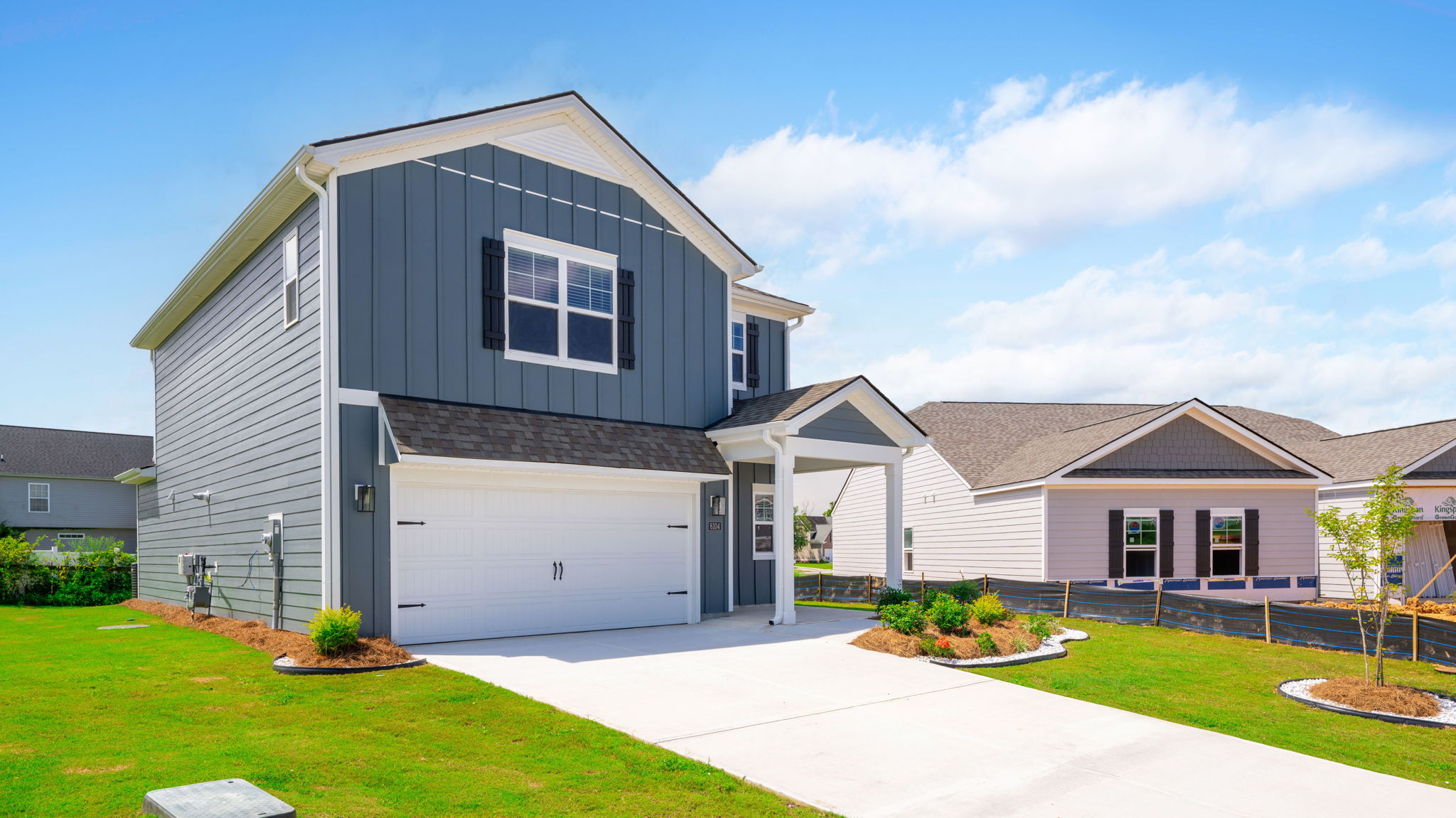 exterior of two story home with board and batten