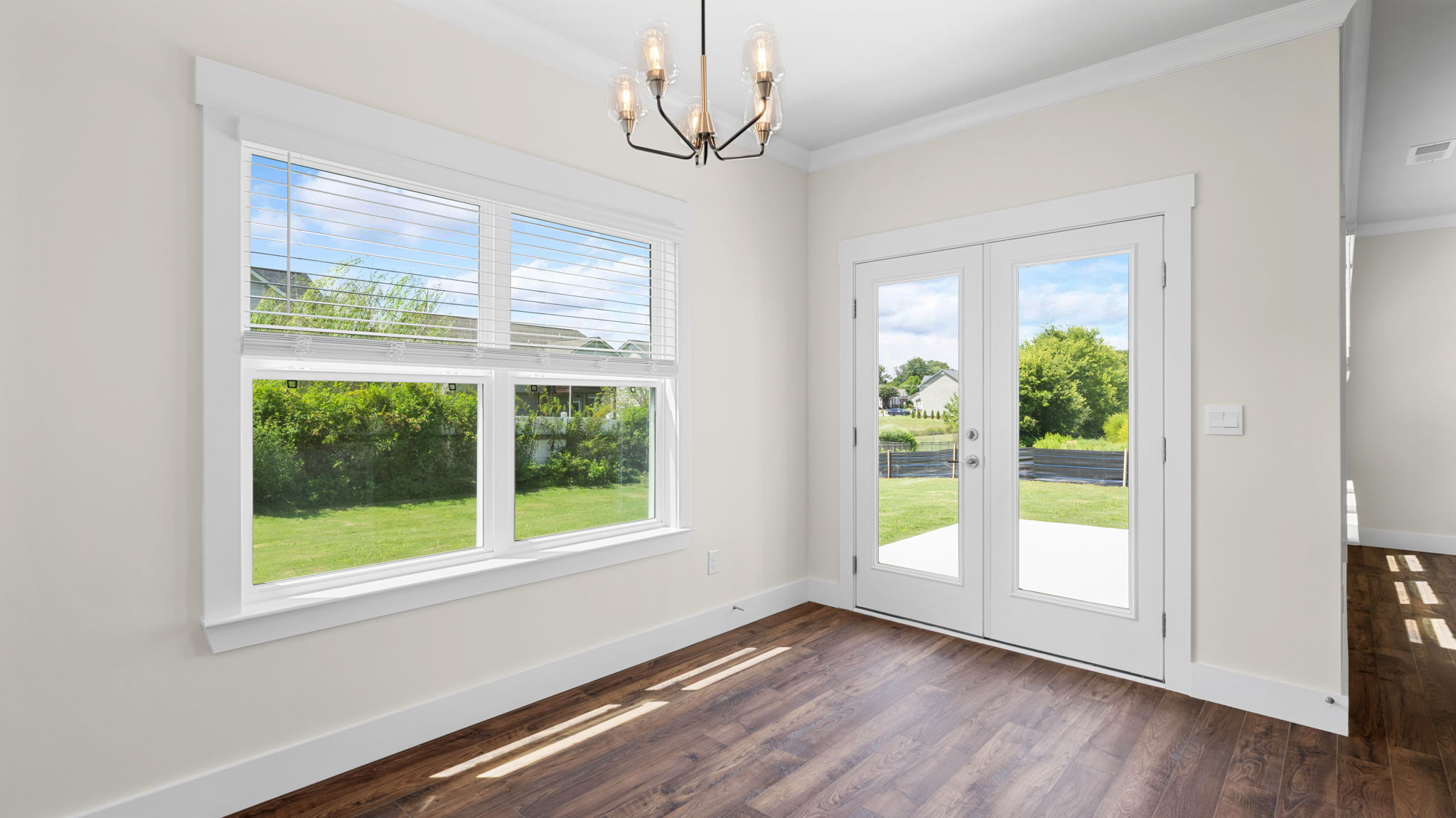 eating area off kitchen with double window