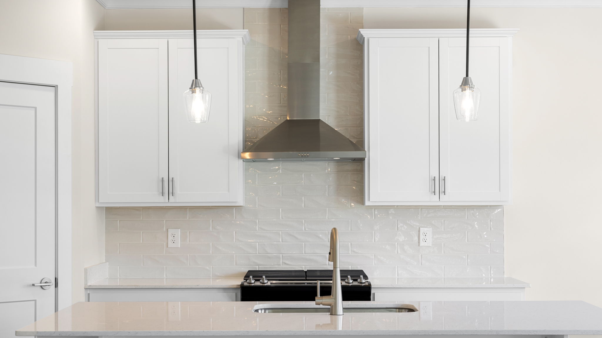 kitchen with large island and pendant lighting