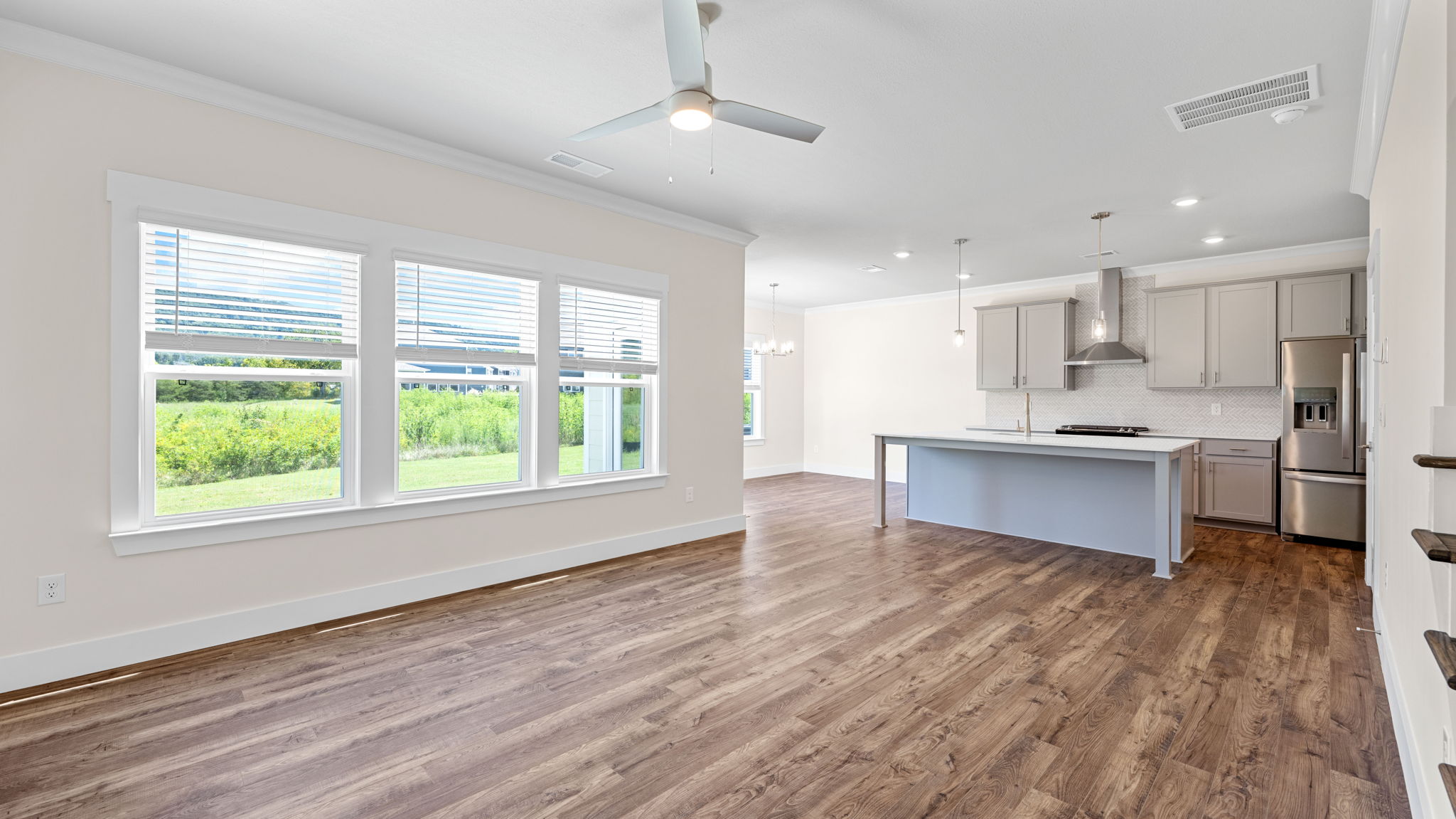 living room with three windows