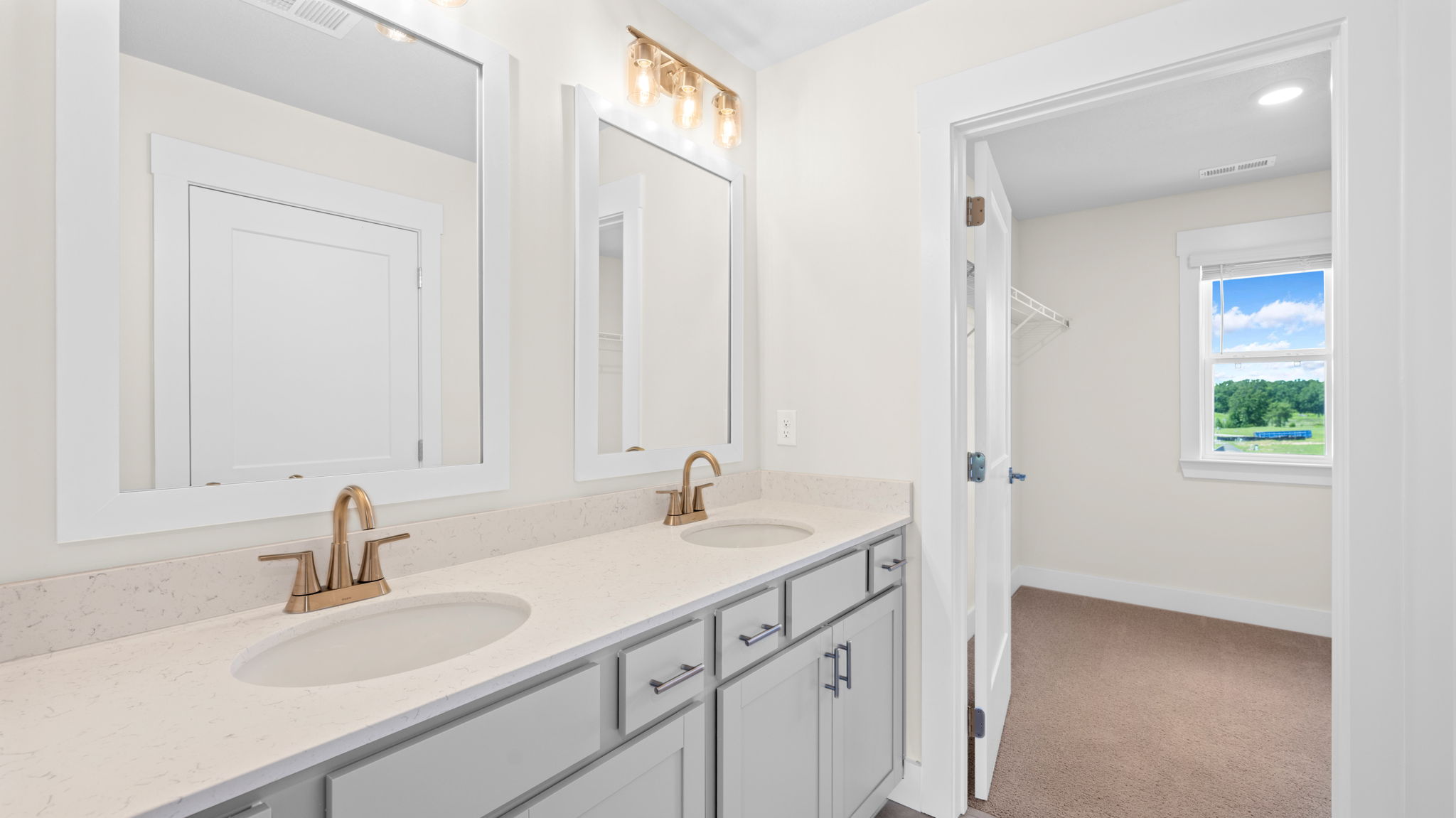 primary bathroom with double vanity