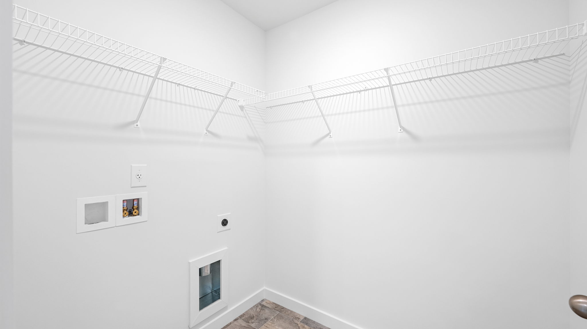 the laundry room has shelving