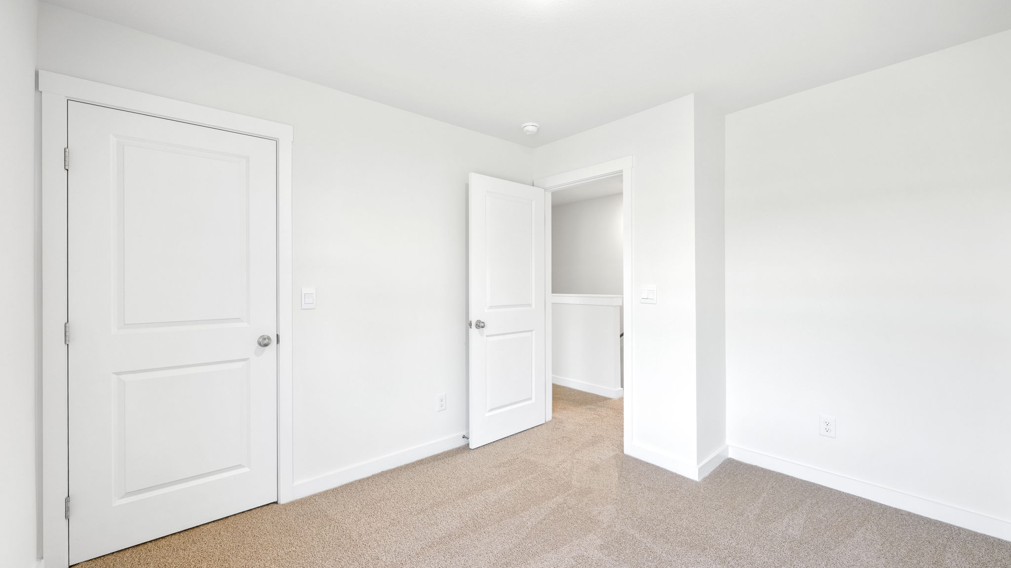 the bedroom has carpet and recessed lighting