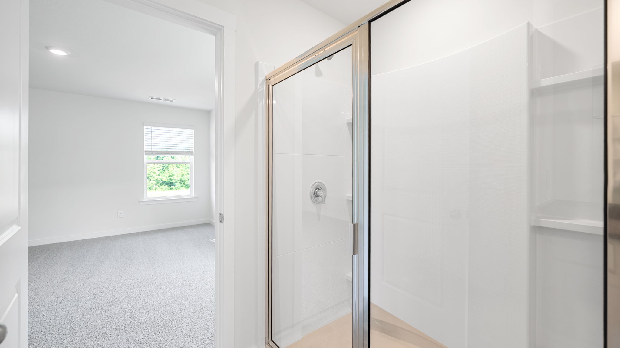 the bathroom opens into the bedroom