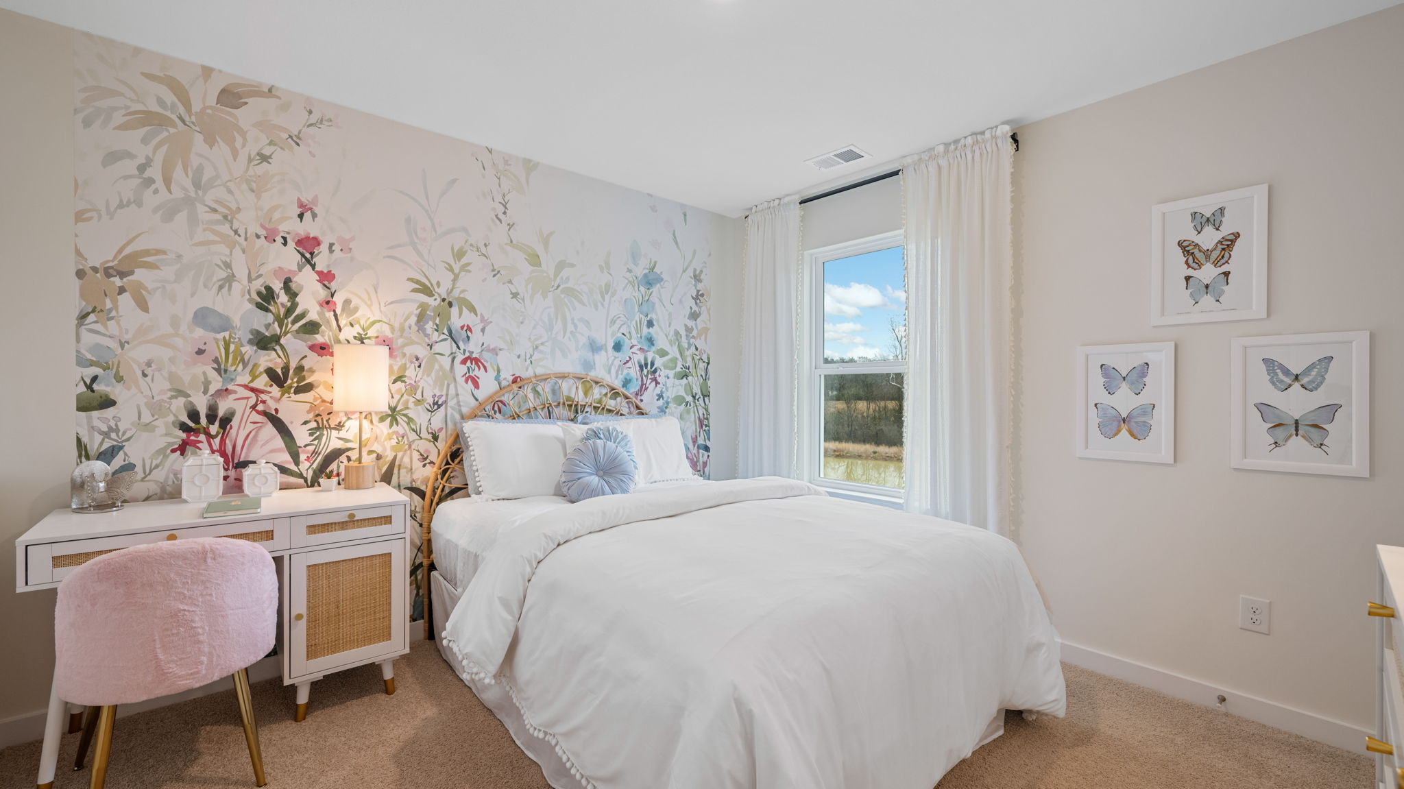 bedroom with single window and walk-in closet