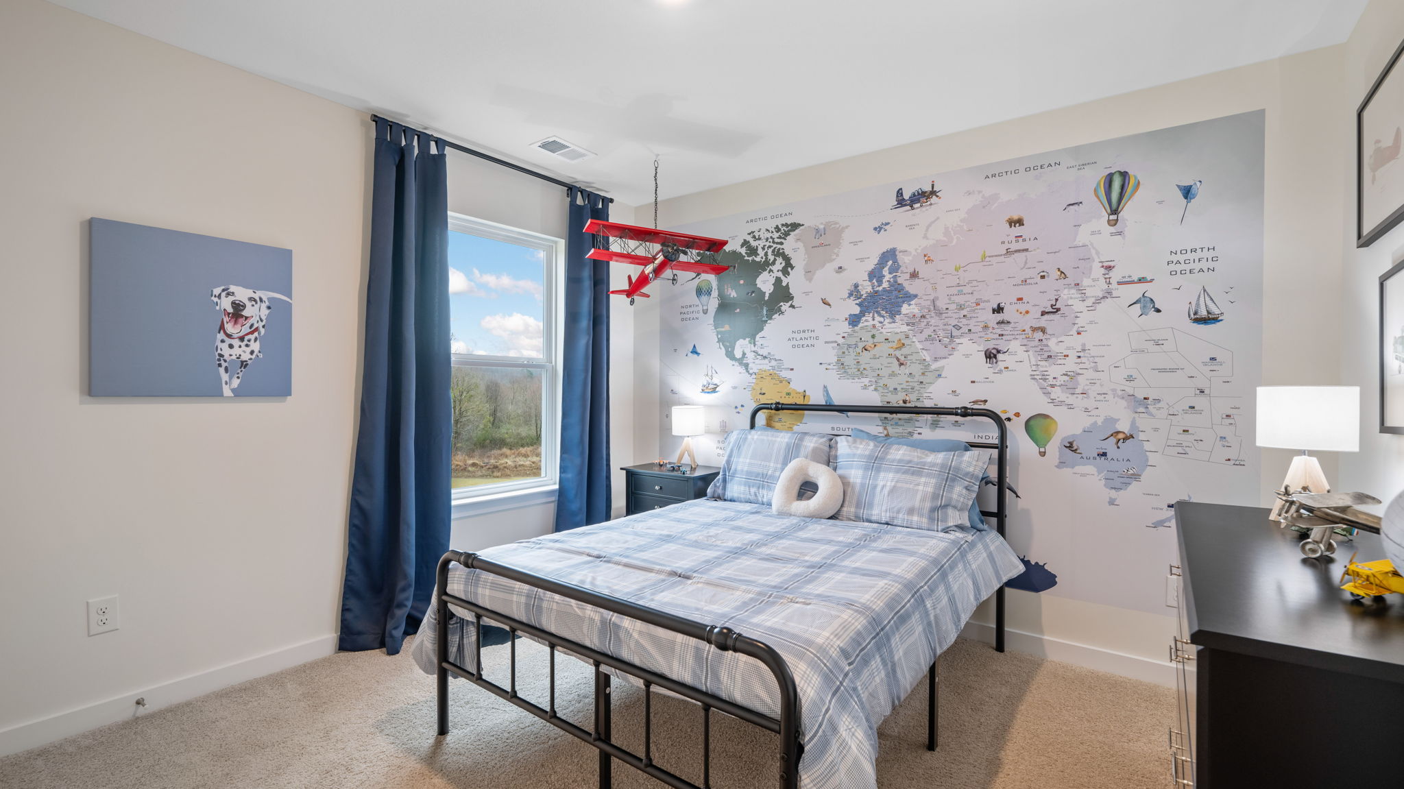 bedroom with single window and walk-in closet