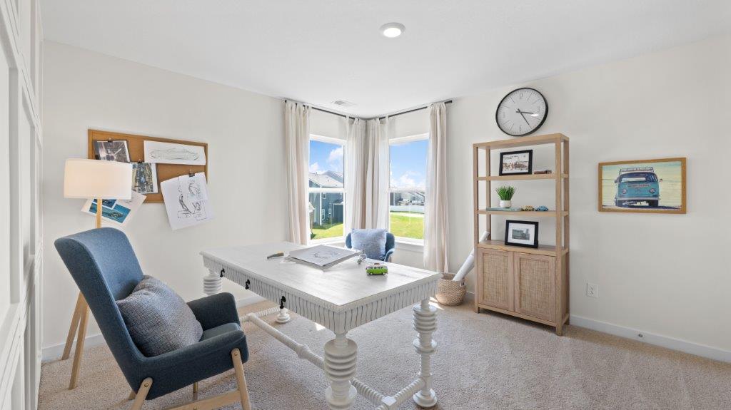bedroom with two single windows and walk-in clsoet