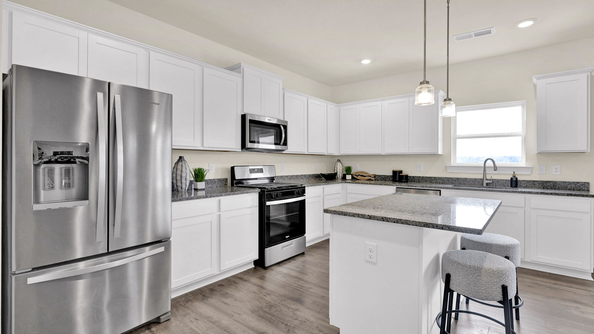 kitchen with island and chairs