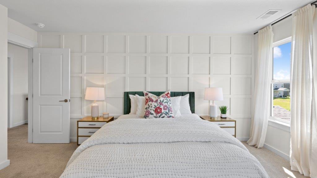 bedroom with two single windows and walk in clsoet