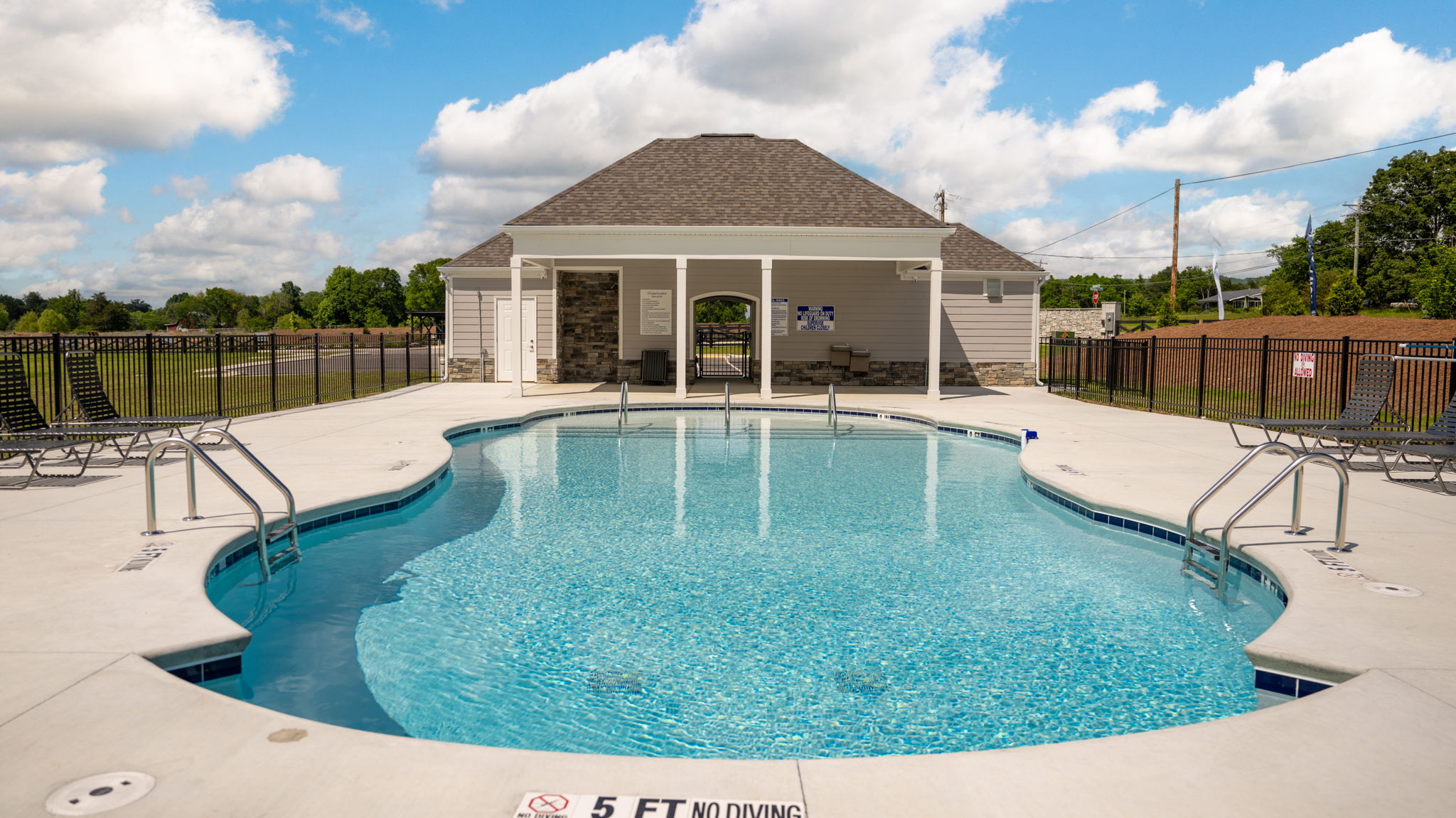 community pool with blue sky
