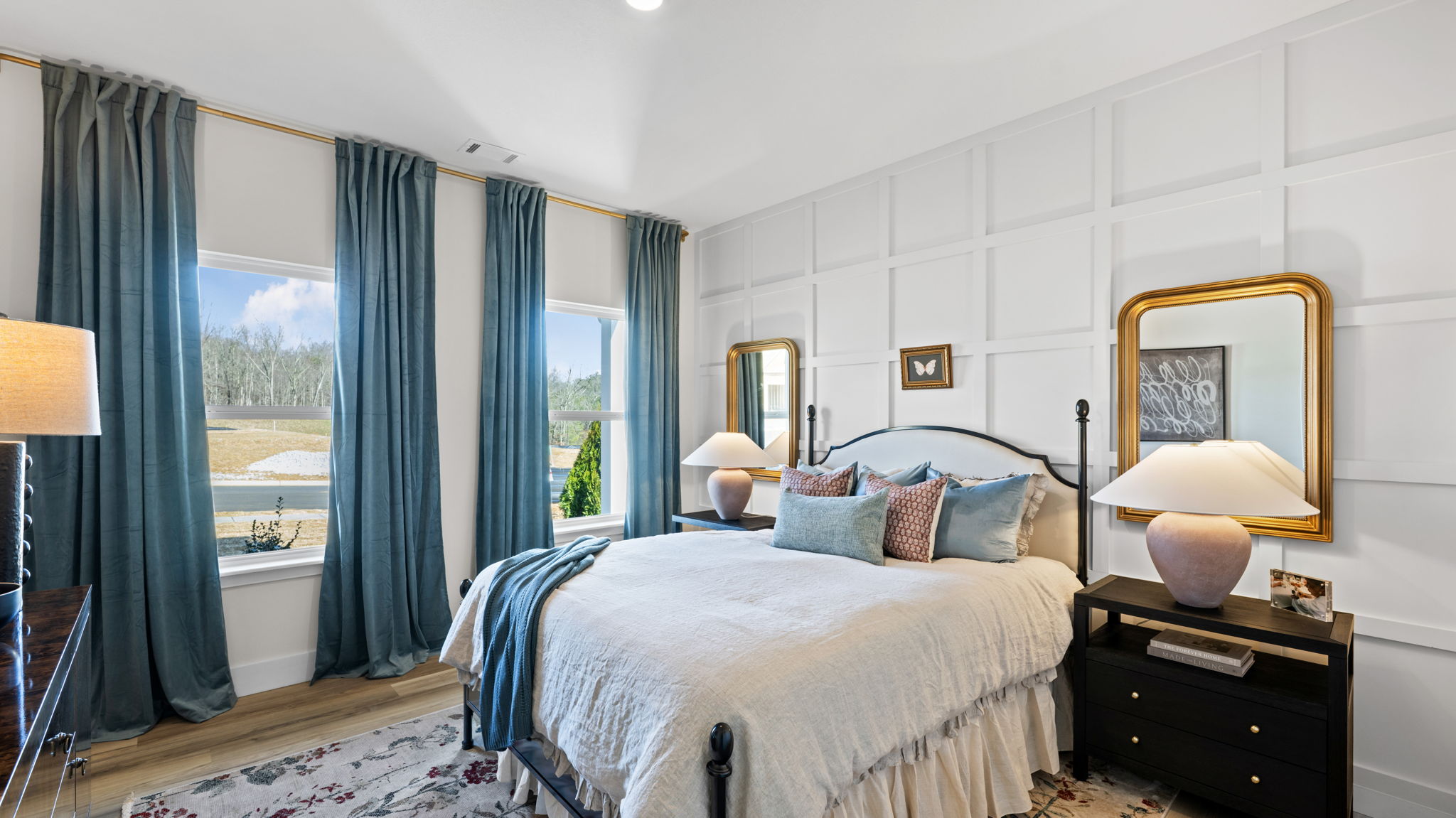 Front guest bedroom with two single windows overlooking the front yard