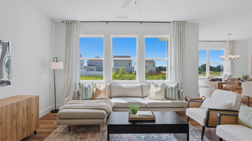 open concept living area with double window