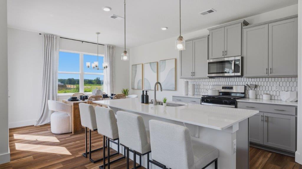 kitchen with large island and stainless steel appliances