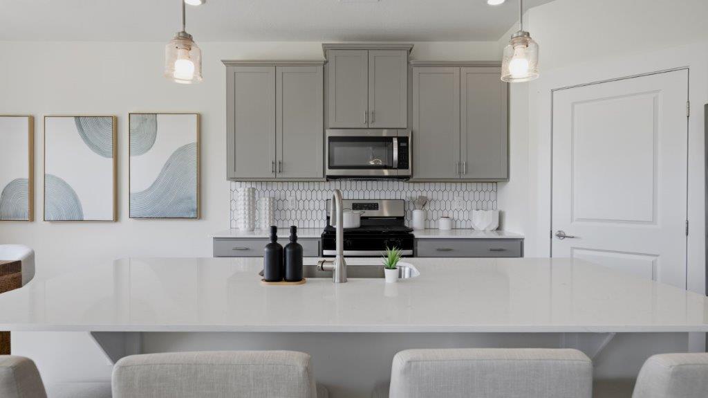 kitchen with large island and stainless steel appliances