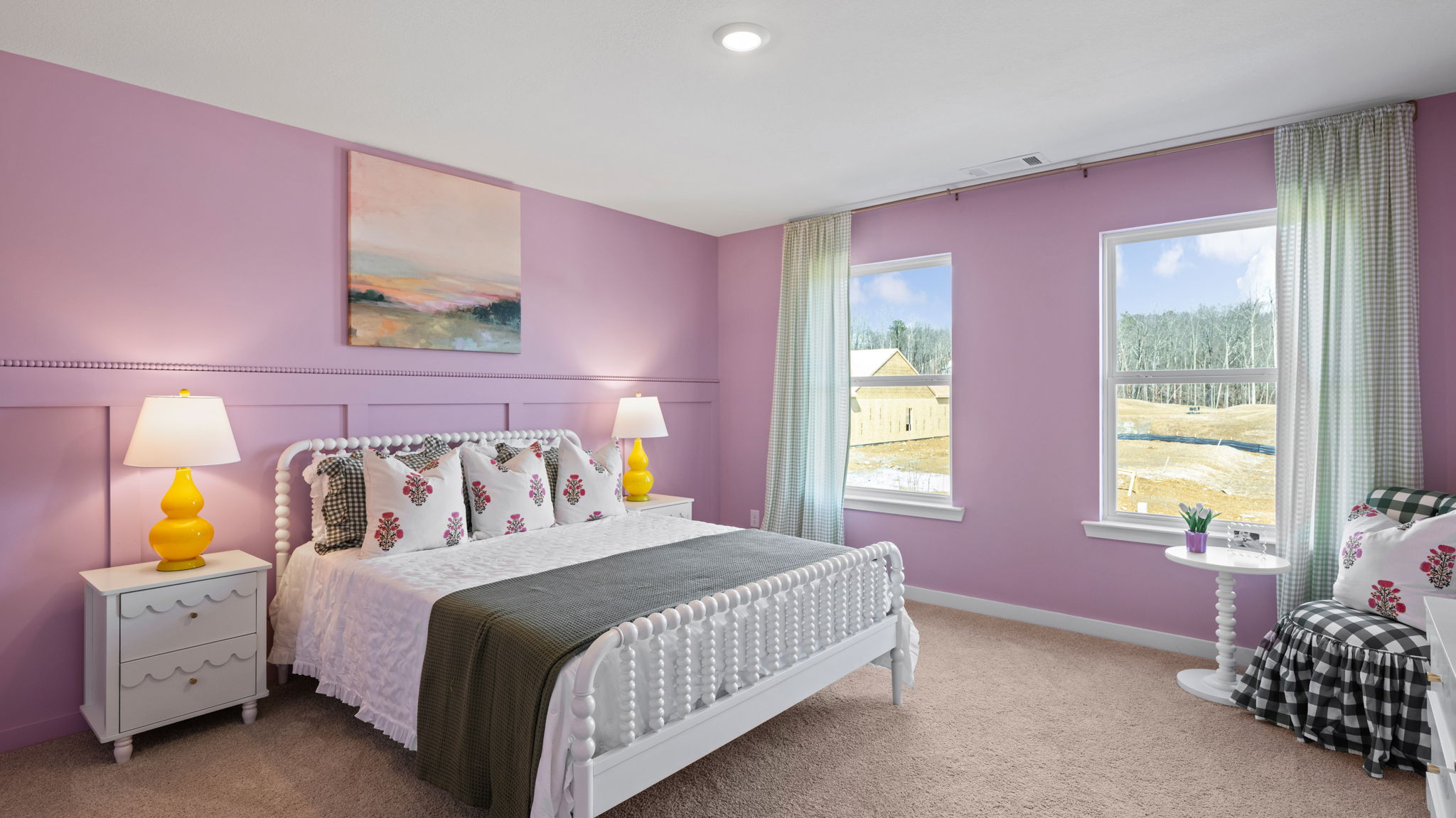 Second floor guest room with trim detail and two single windows