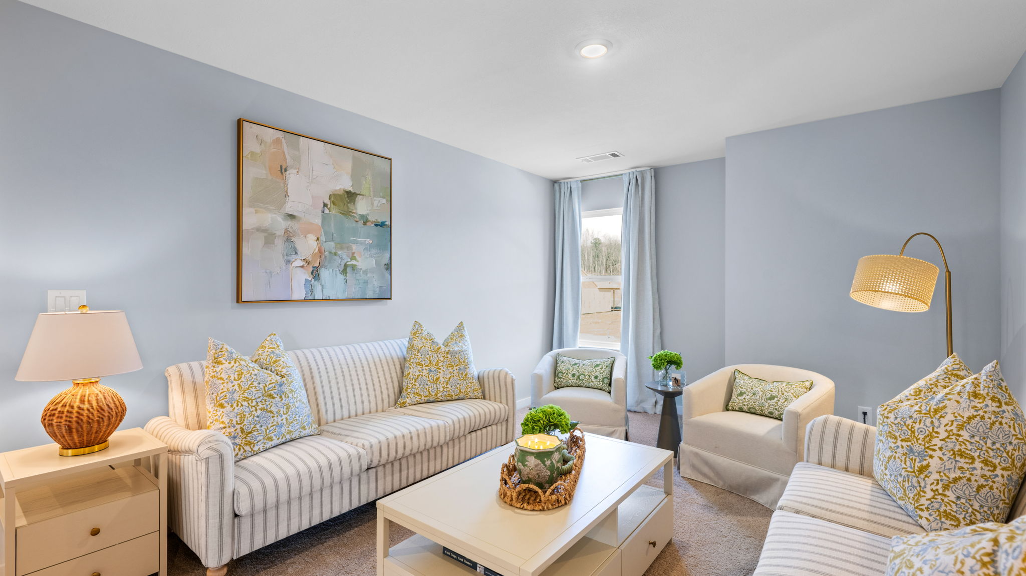 Loft area staged as seating rom