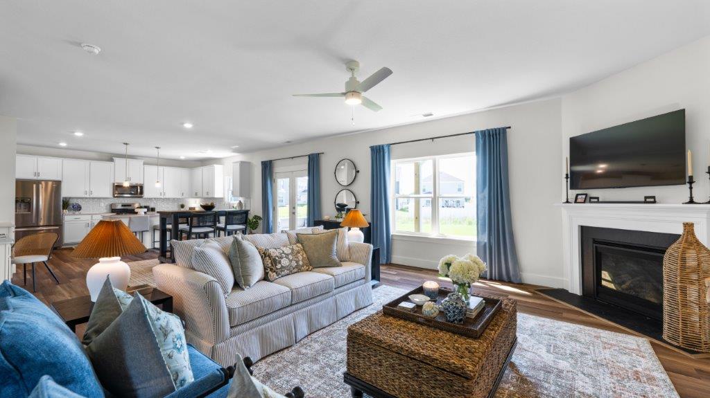 open concept living area with double window