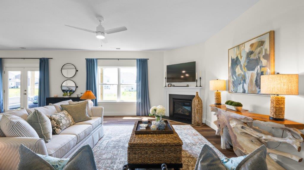open concept living area with double window