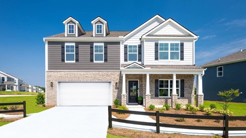 Exterior of Columbia model home at Watercolour two car garage two story home