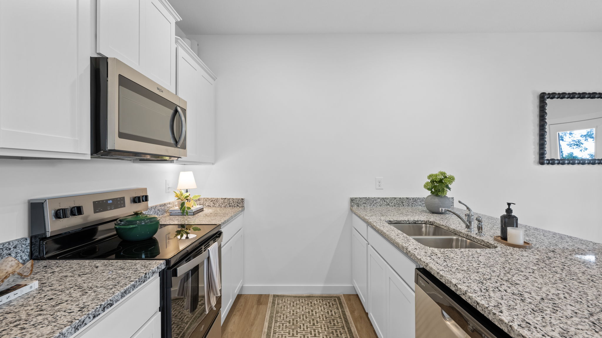 Kitchen with stainless steel appliances and granite counter top
