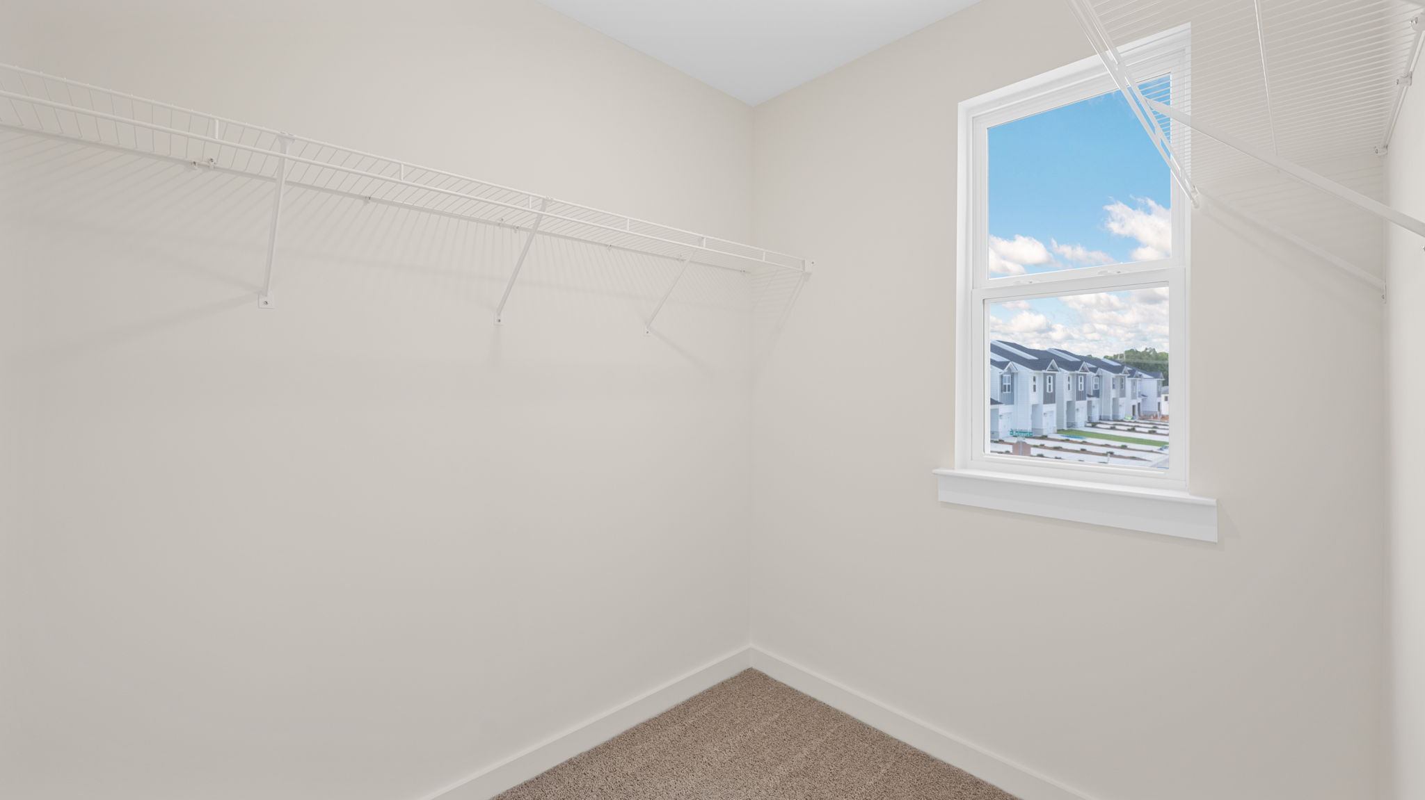Walk in closet with single window