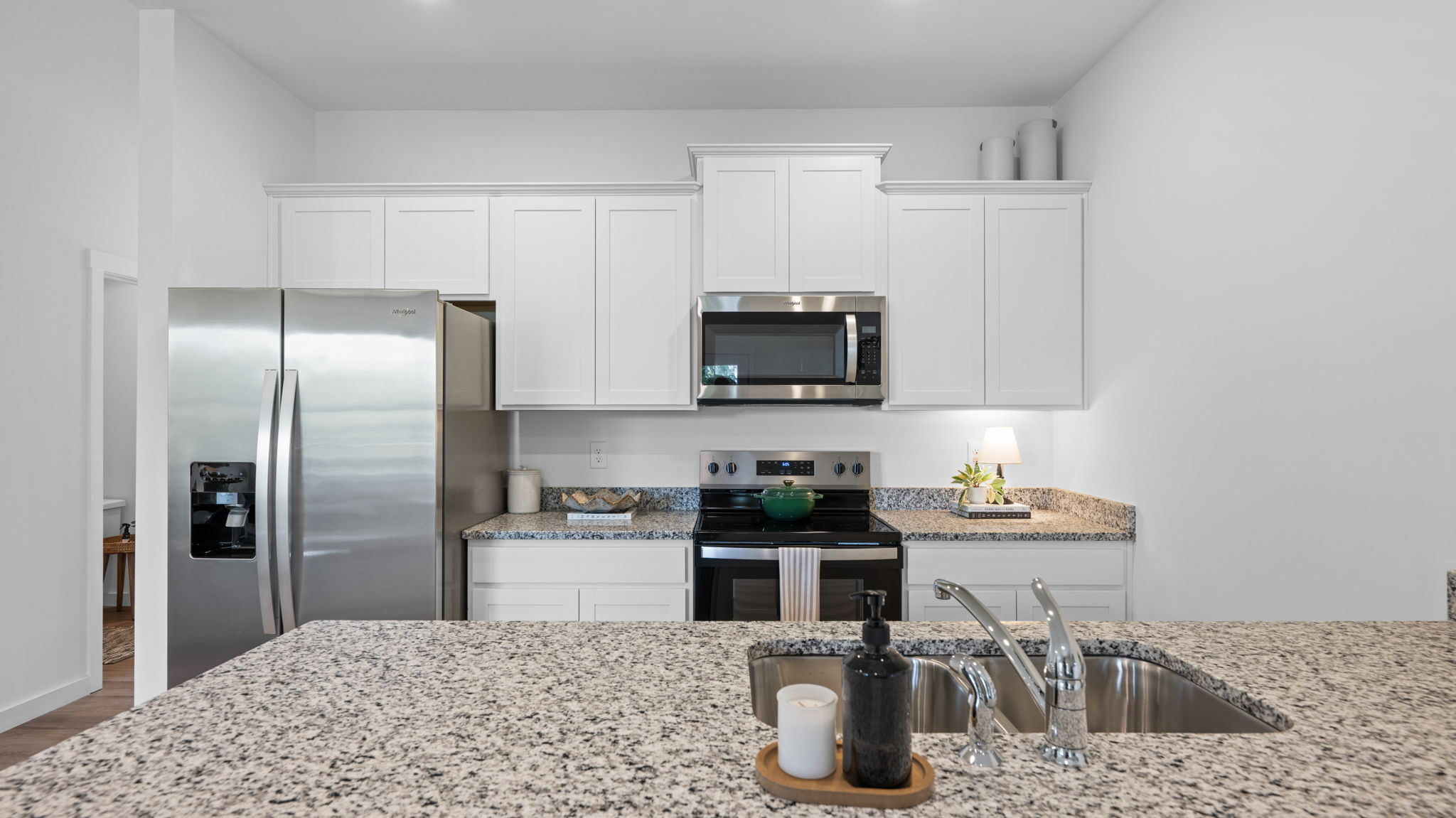 open concept kitchen with stainless steel appliances
