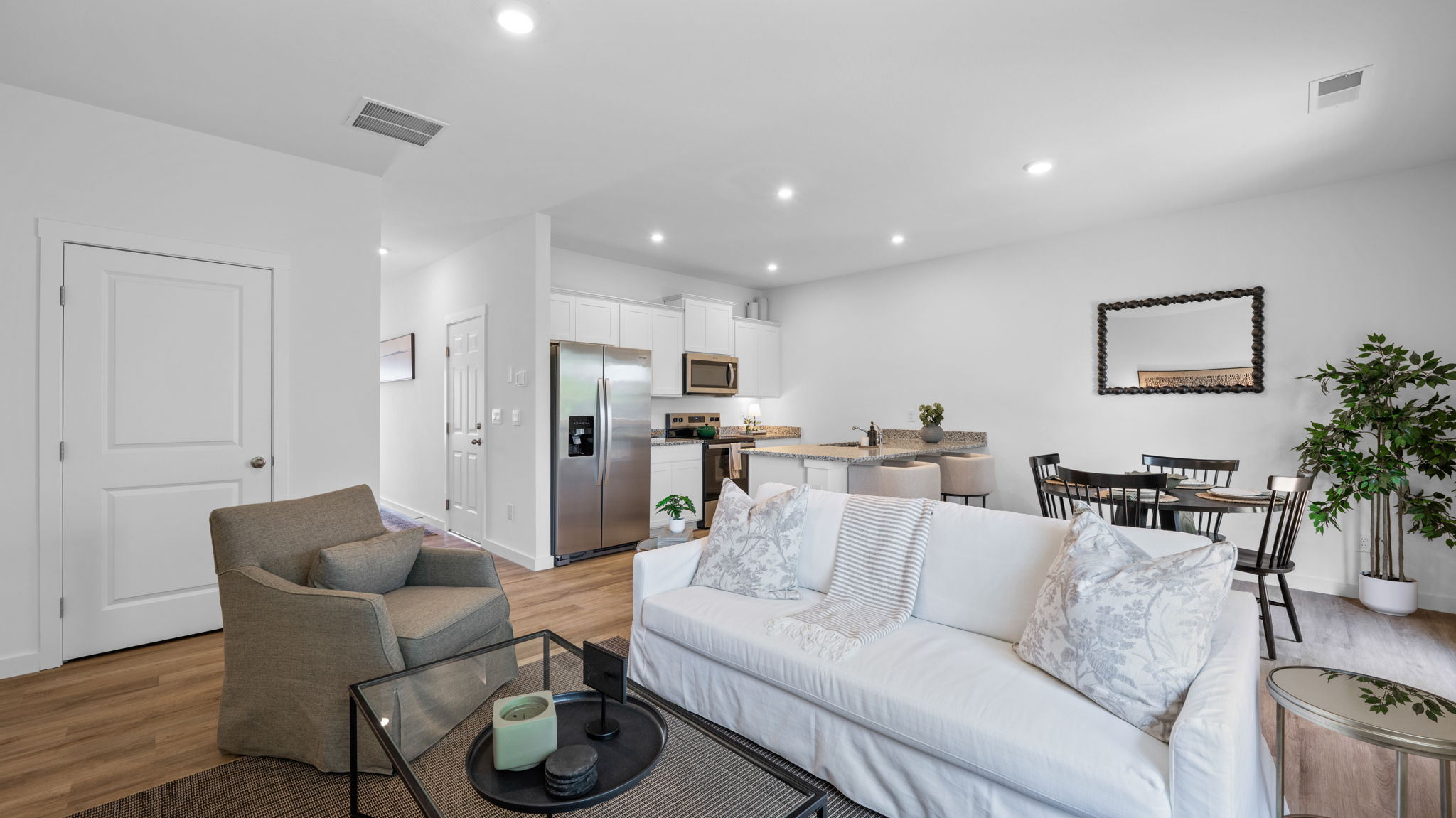 open concept living room with double windows