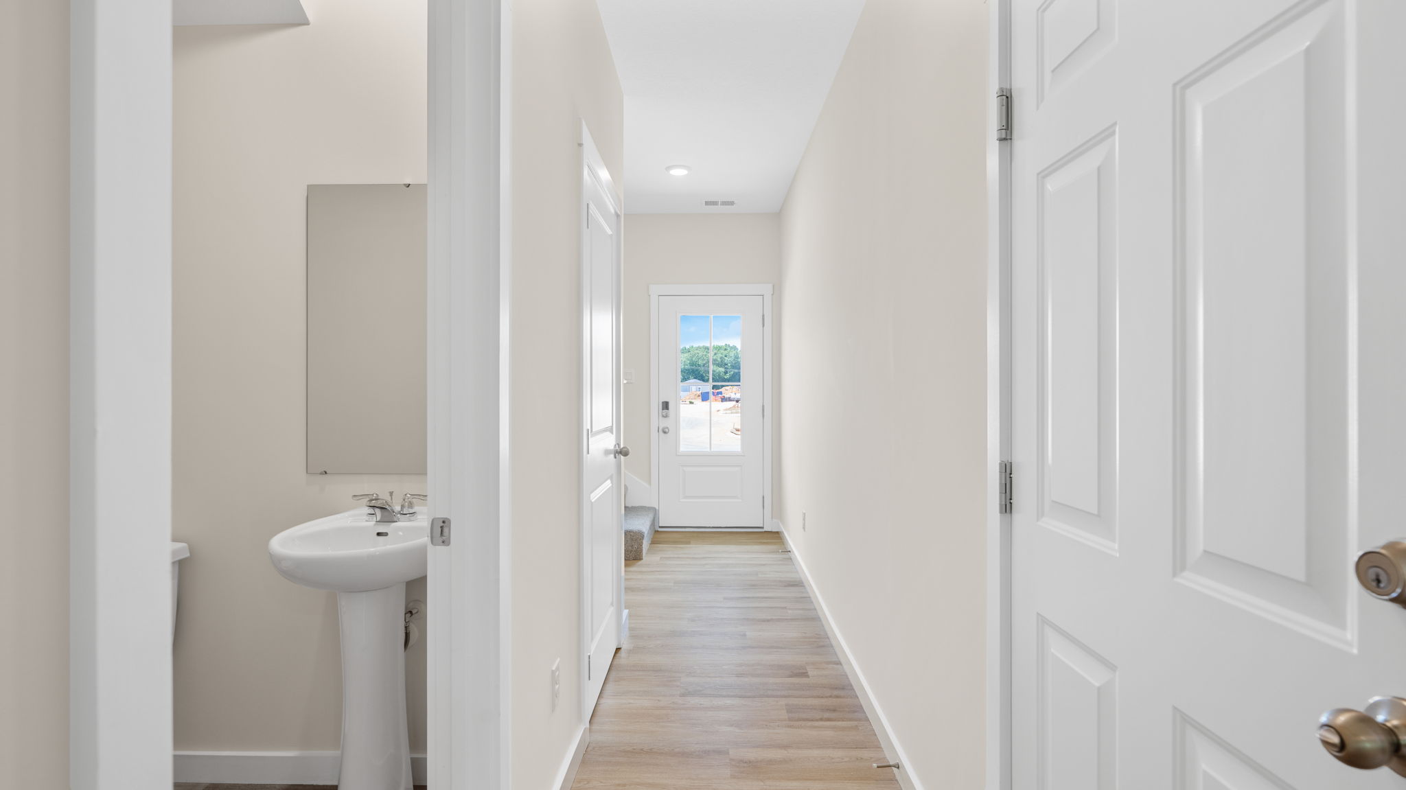 entry hallway with half bath