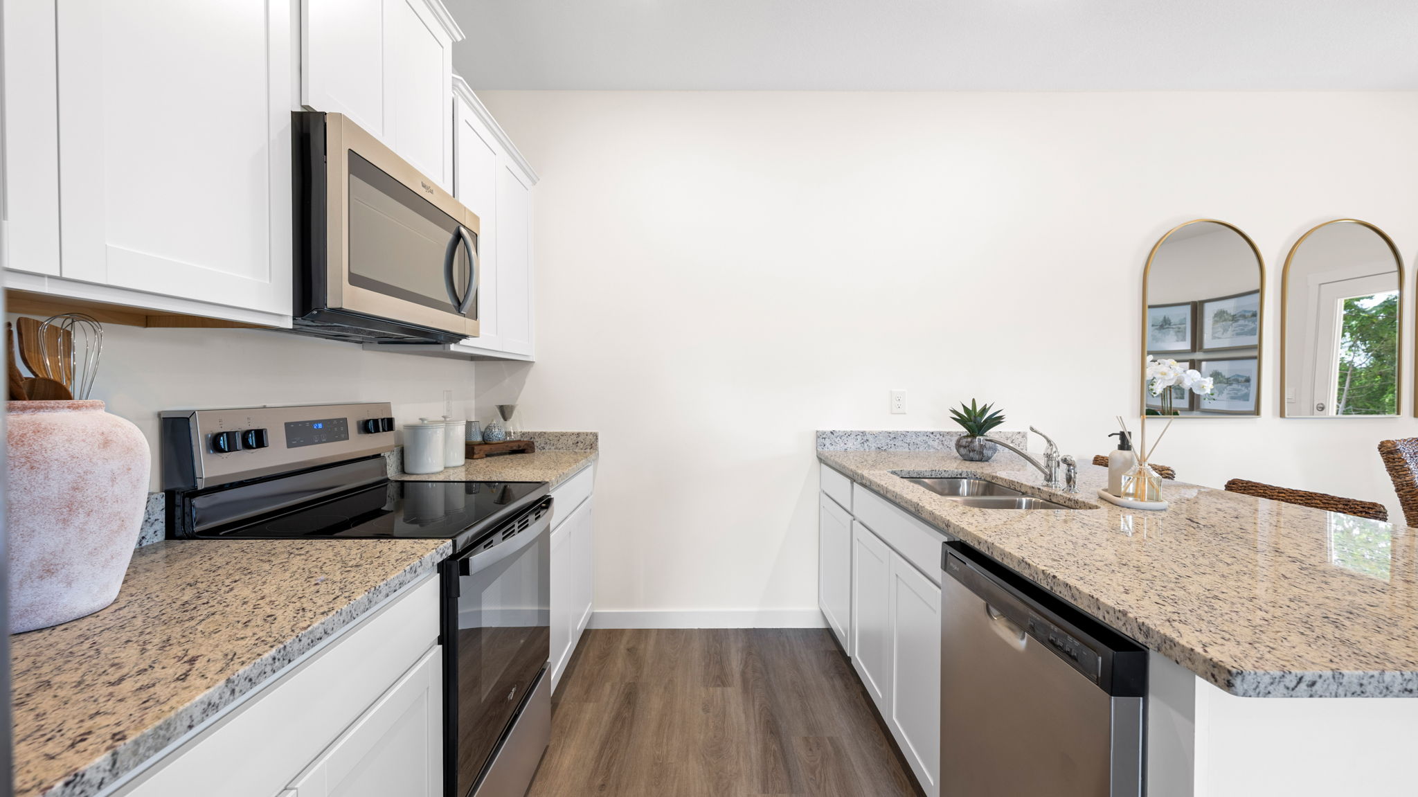open concept kitchen with stainless steel appliances