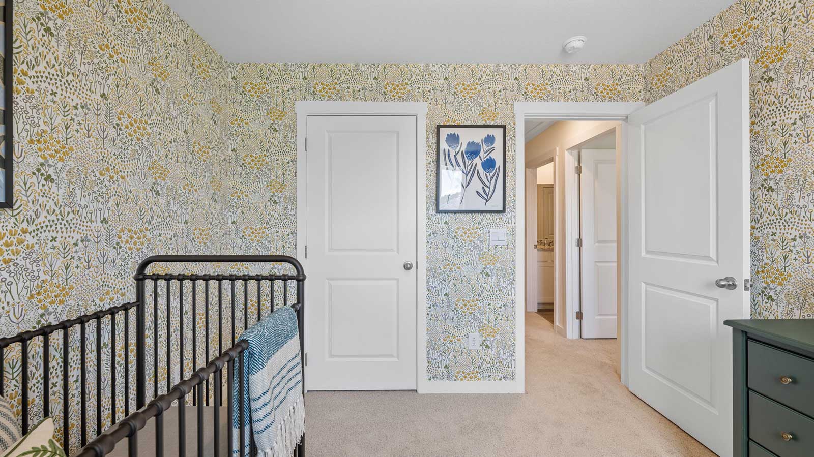Bedroom with simple decor and a closet.