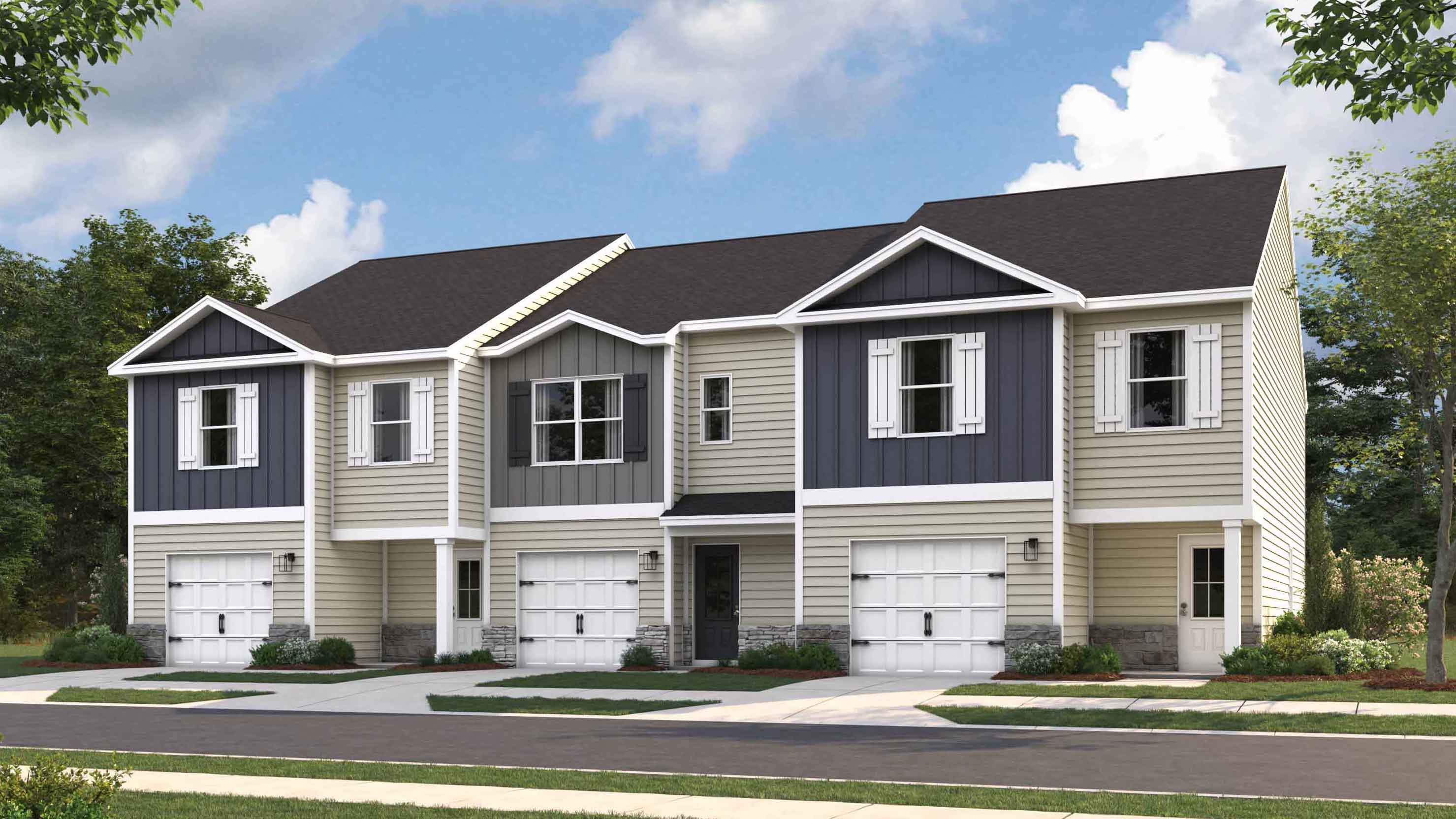 Exterior rendering of townhome units with blue sky
