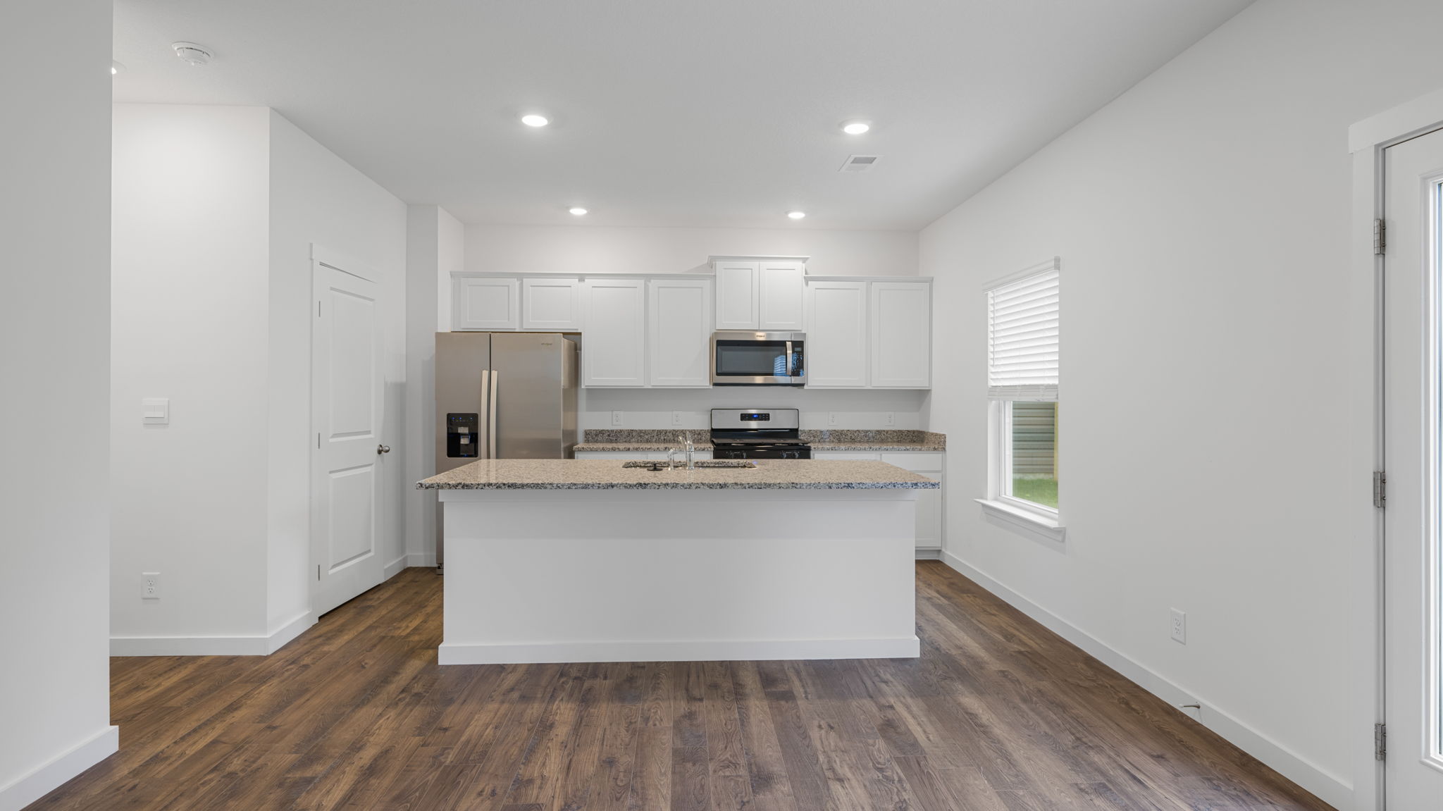 facing kitchen with dining space