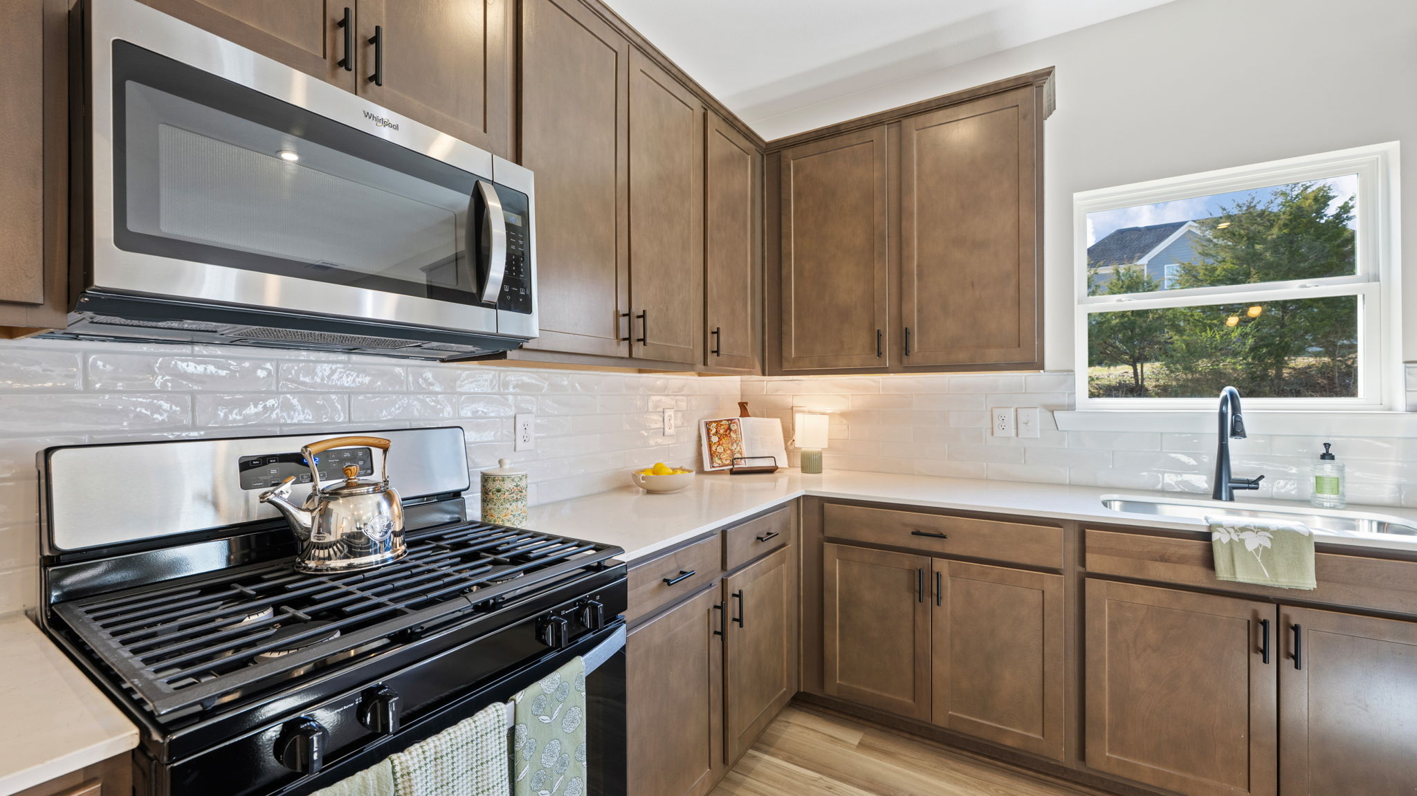 Open concept kitchen with stainless steel appliances