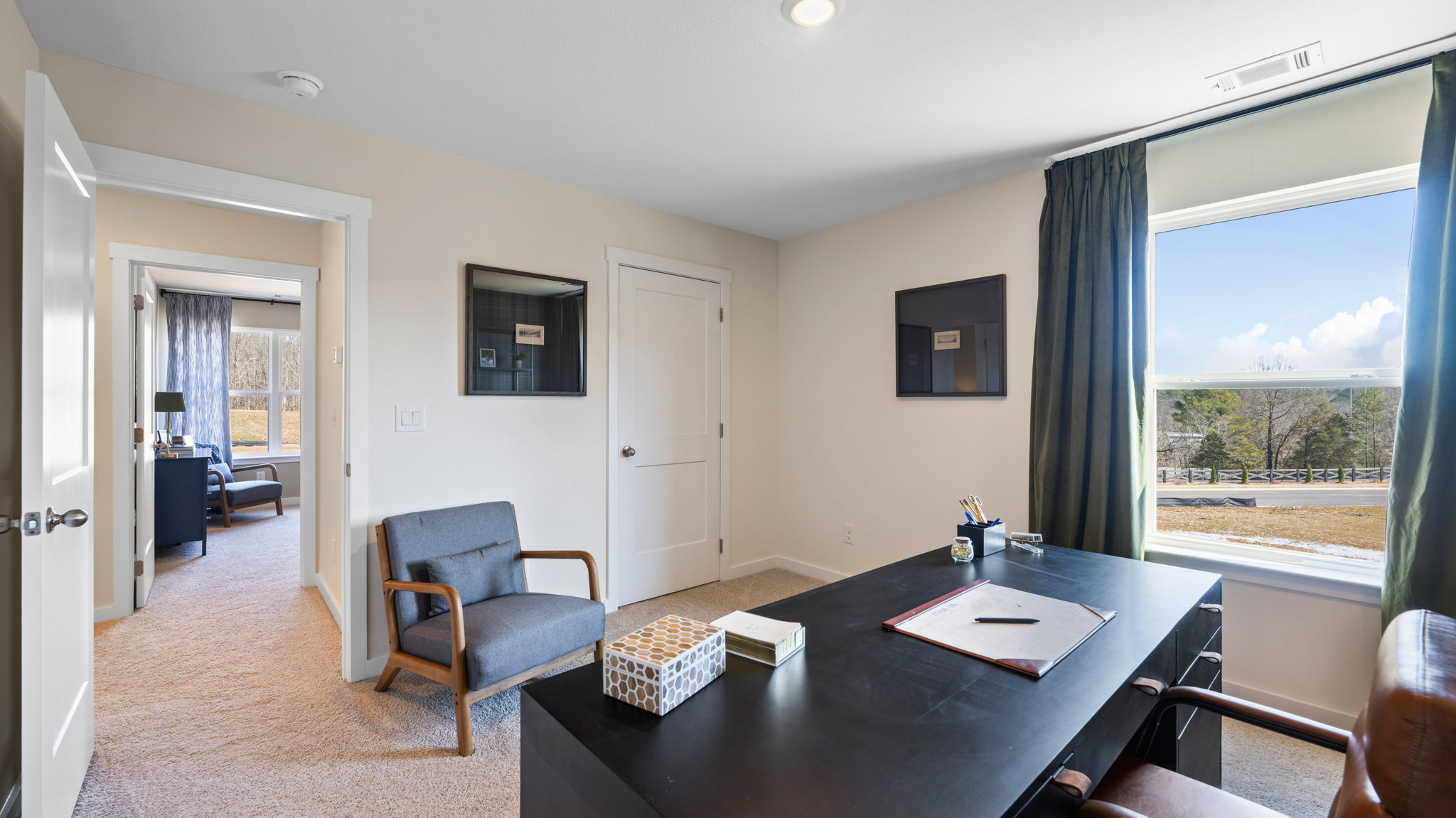 office/ flex room with single window and walk-in closet