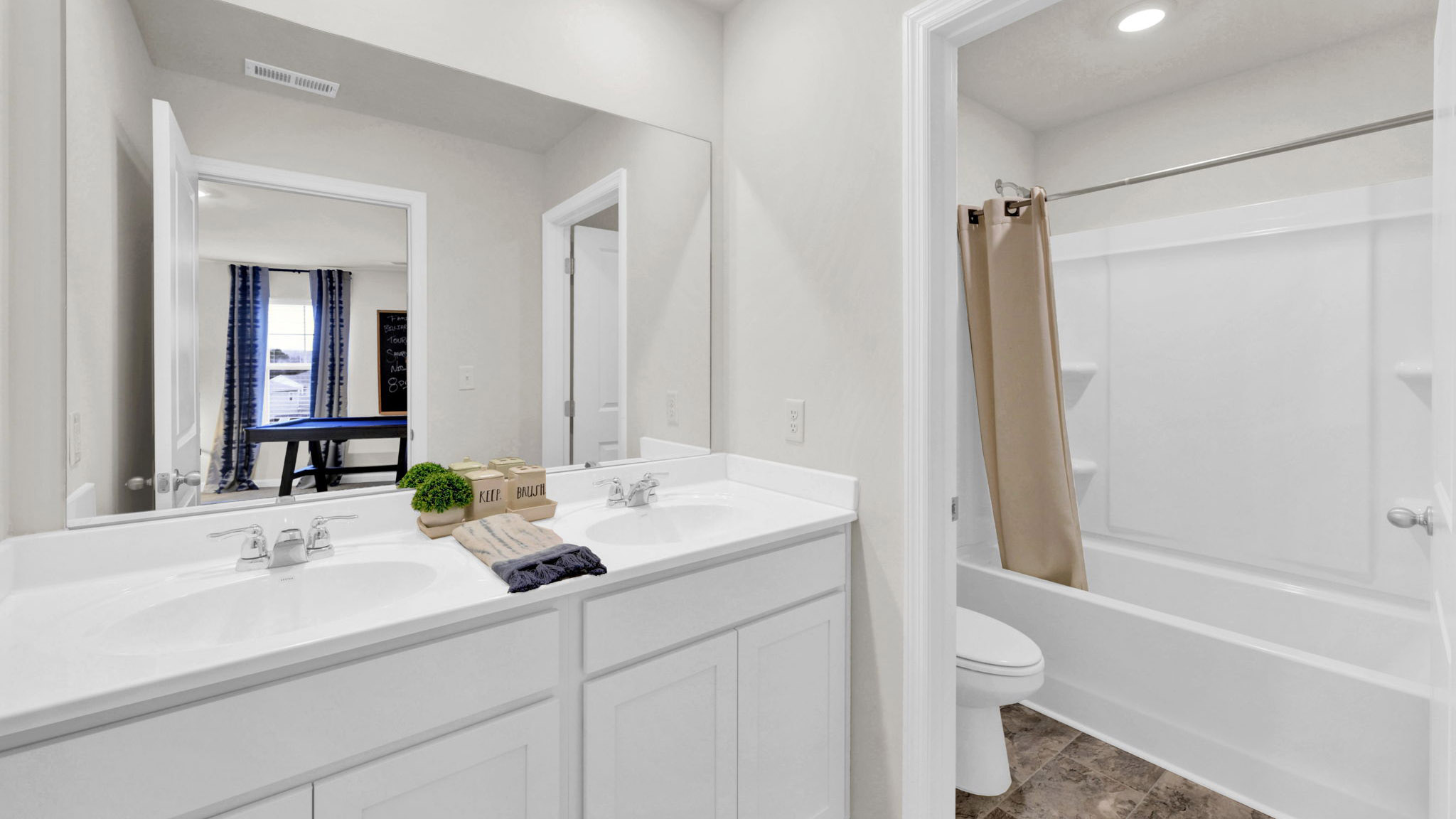 full bathroom with double vanity