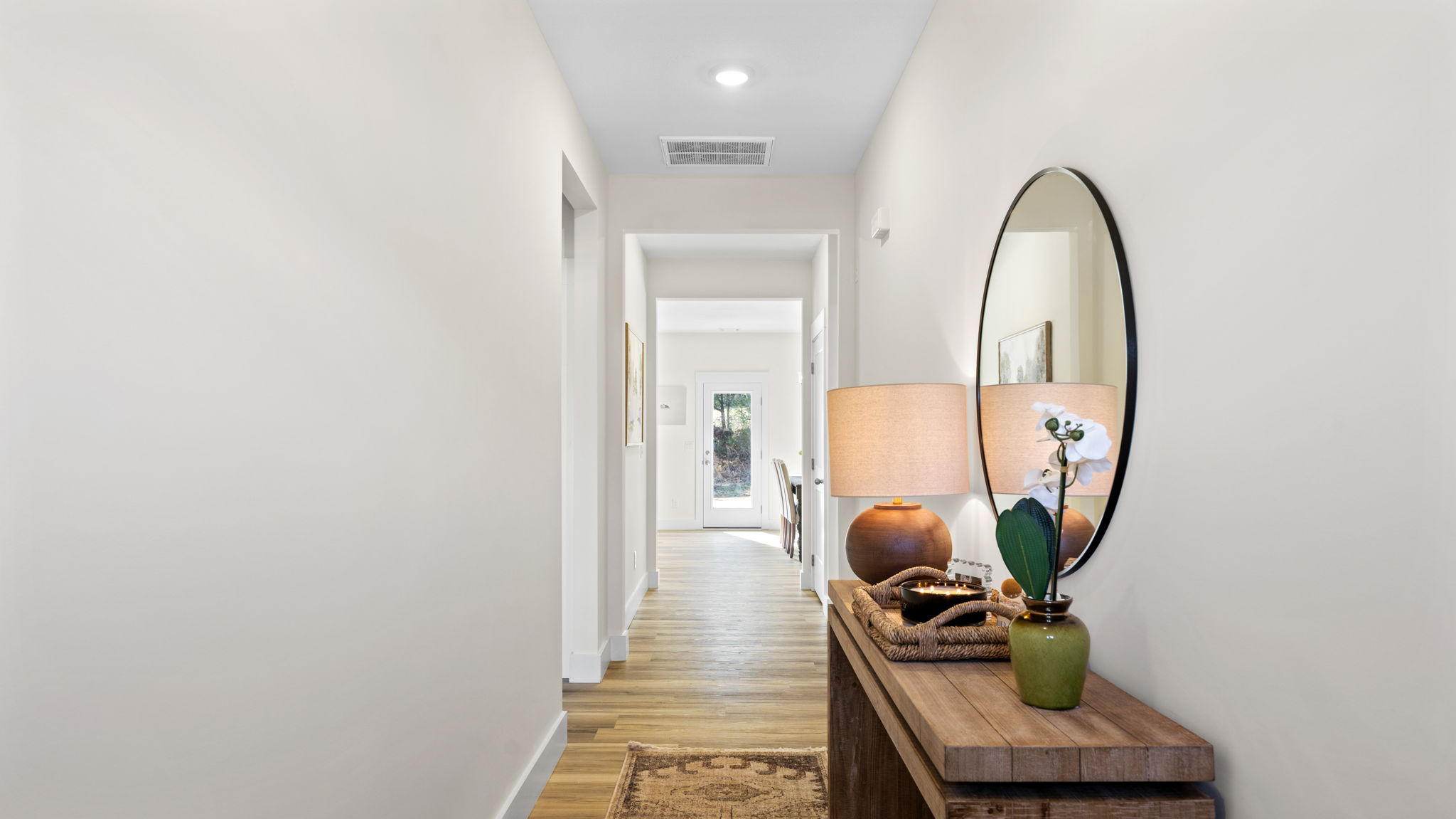 entryway hallway with bedroom on the left