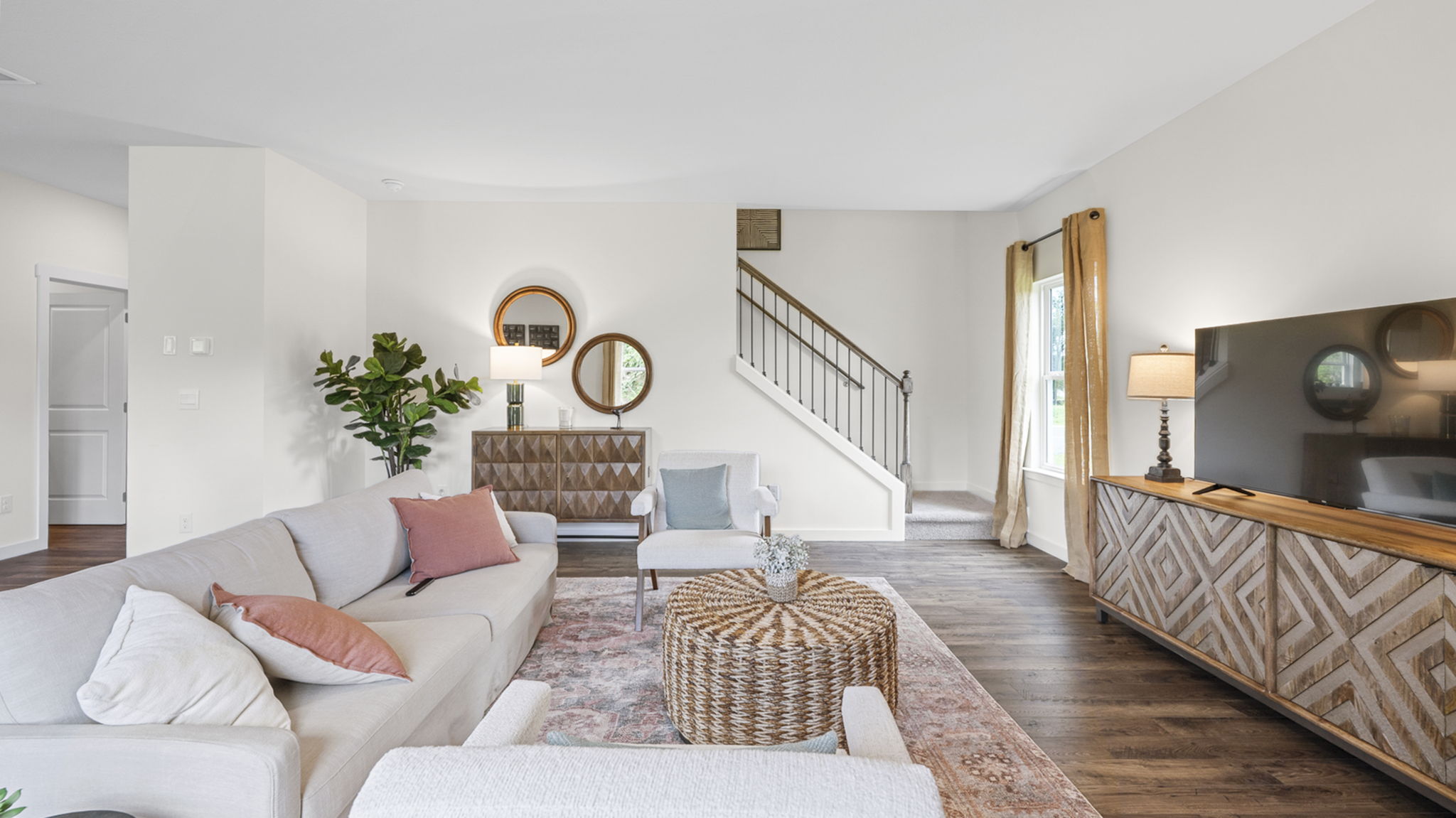 living room with stairs and single window