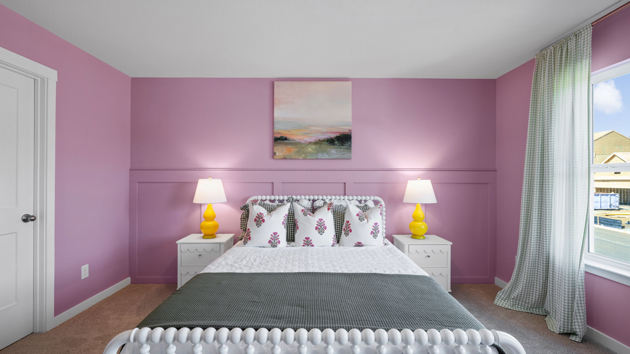 bedroom with two single windows and walk-in closet