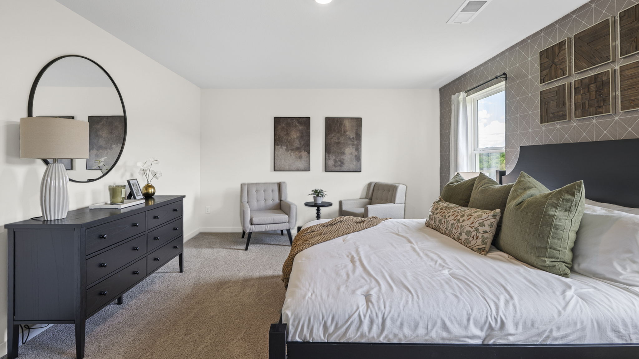 primary bedroom with extra room for seating