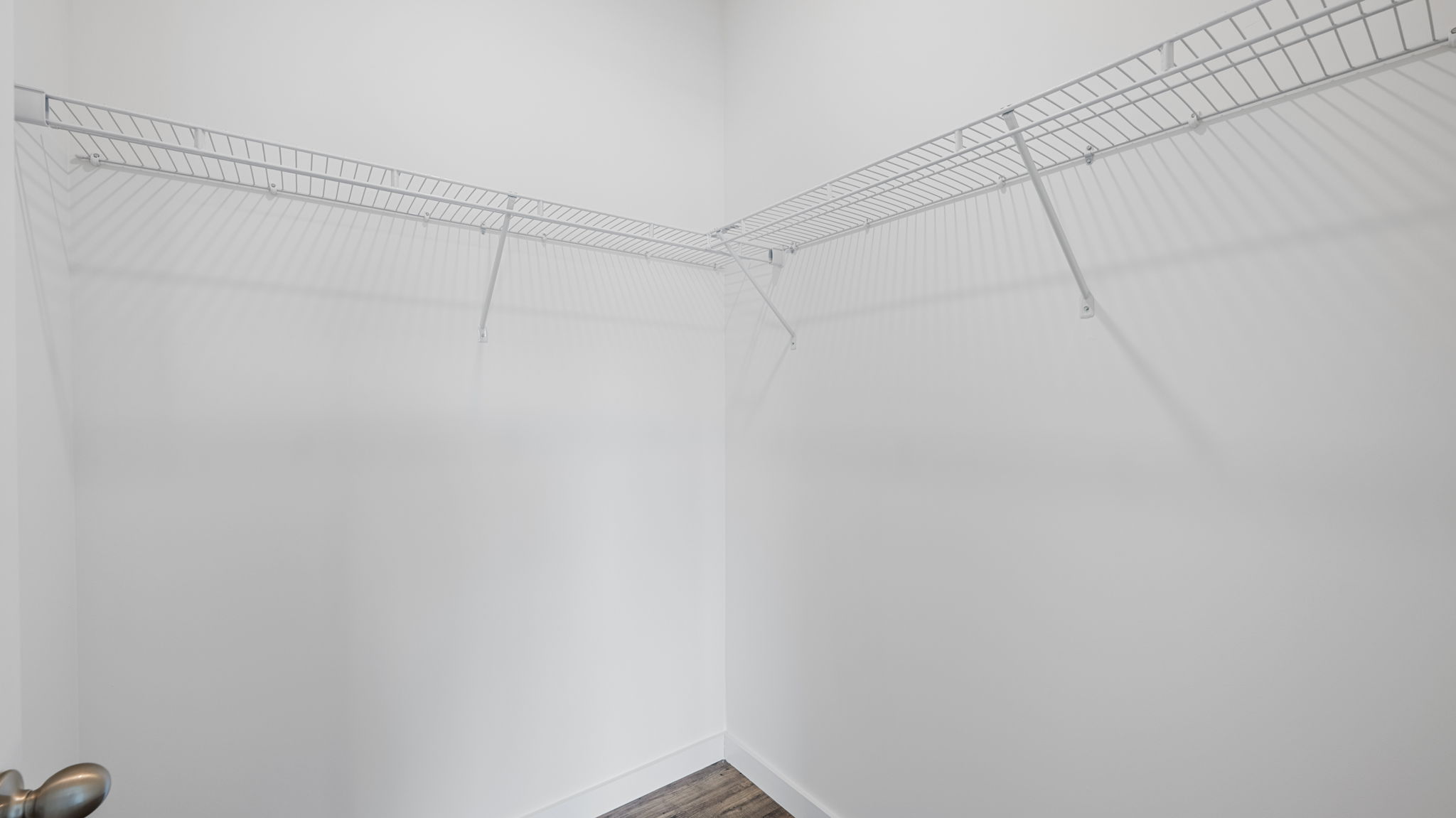 primary bedroom walk-in closet